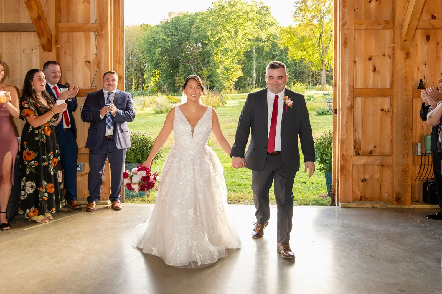 Wedding reception moment at Harvest Moon Farm in Winthrop Maine