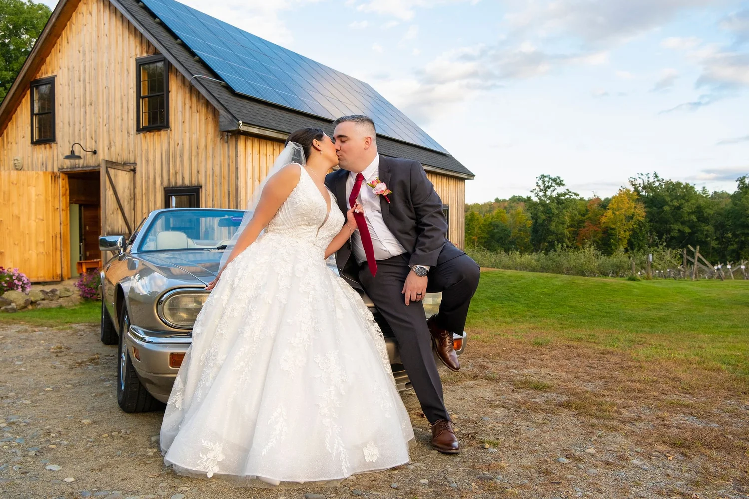 Couple portrait in the fields at Harvest Moon Farm in Winthrop Maine at sunset