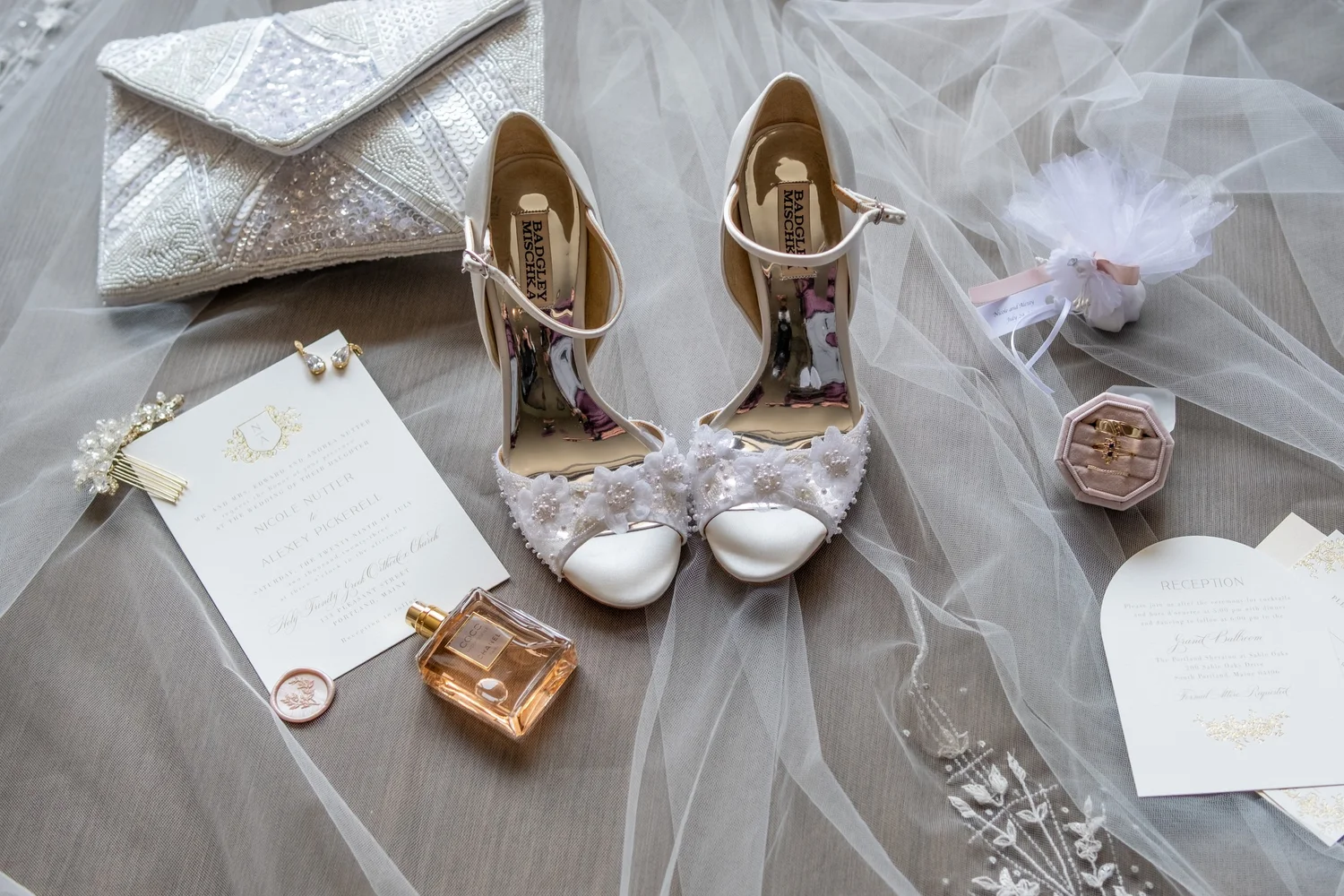 Nicole's wedding details with shoes perfume rings and clutch at Portland Sheraton at Sable Oaks South Portland Maine summer wedding photography VMG Productions