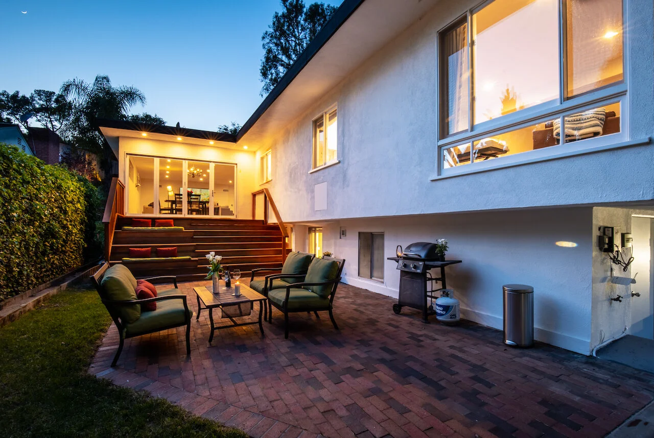 EXTERIOR-BACKYARD PATIO TWILIGHT.jpeg