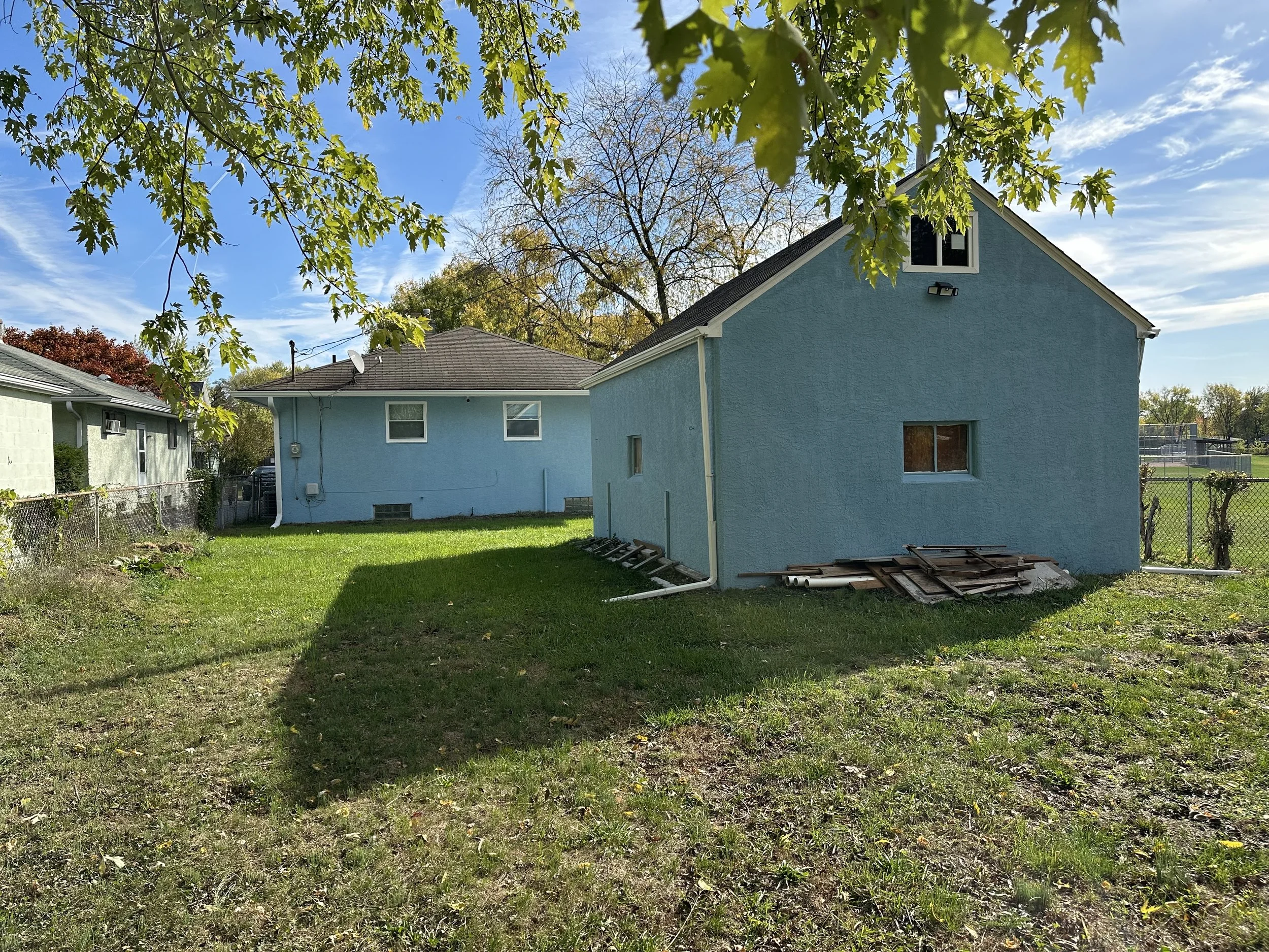 You can see the lot is fairly long, with areas of sun and shade adjacent the garage.
