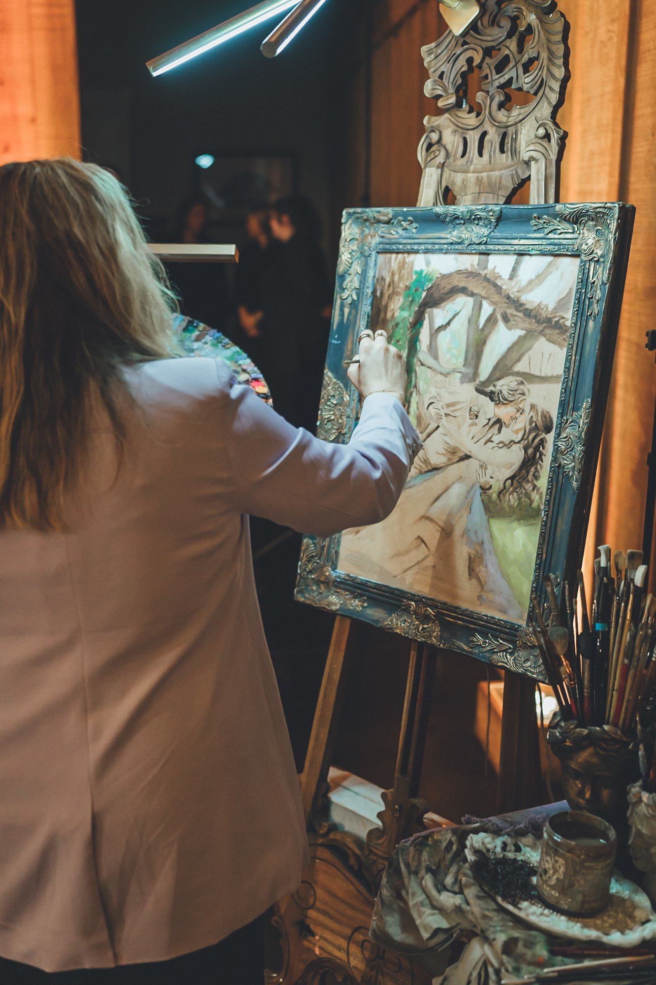 Southern Palms Studio with live painter at couples' wedding at Bowing Oaks in Jacksonville, FL.jpg