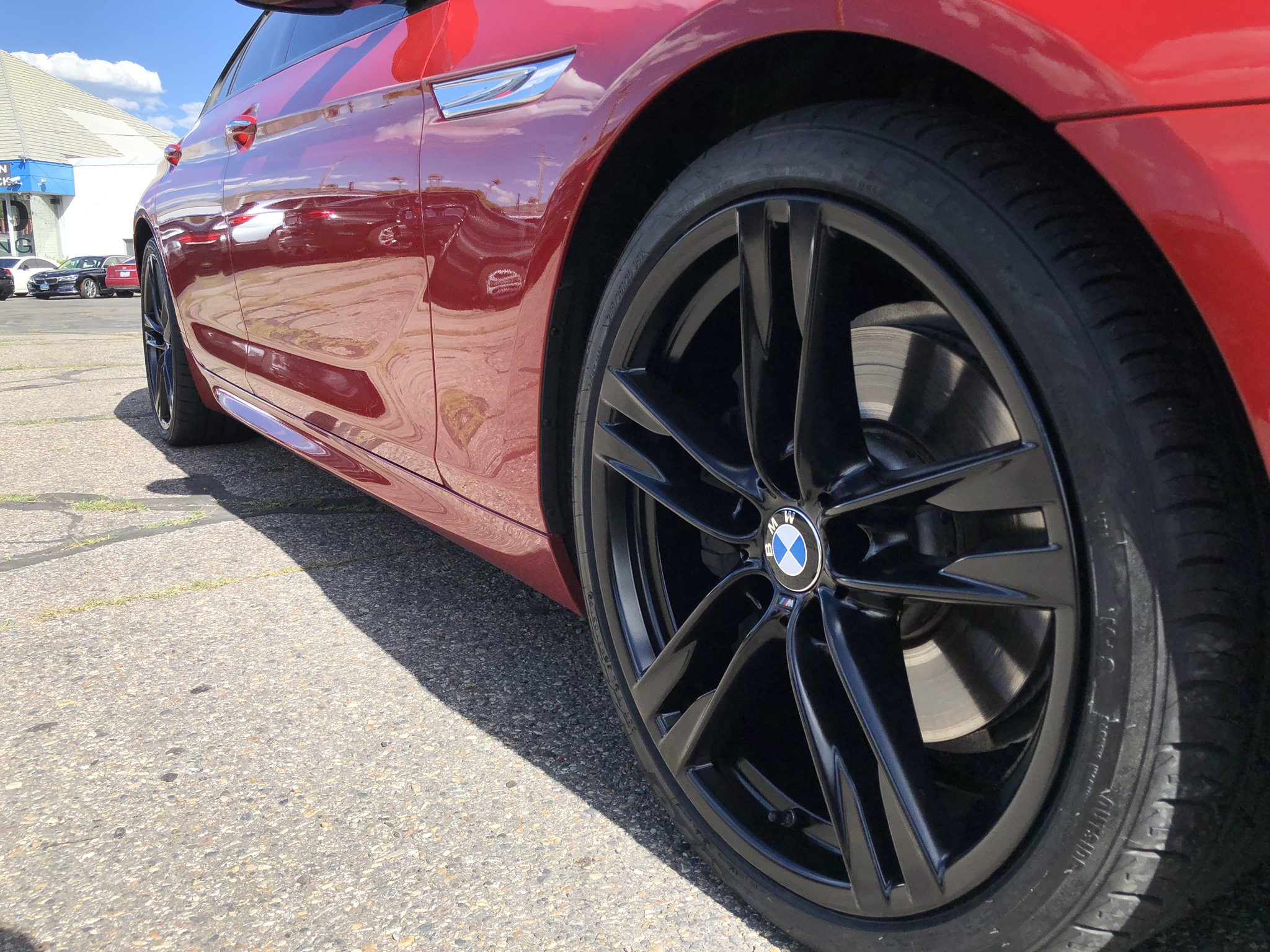 BMW 650i after satin black wheel painting