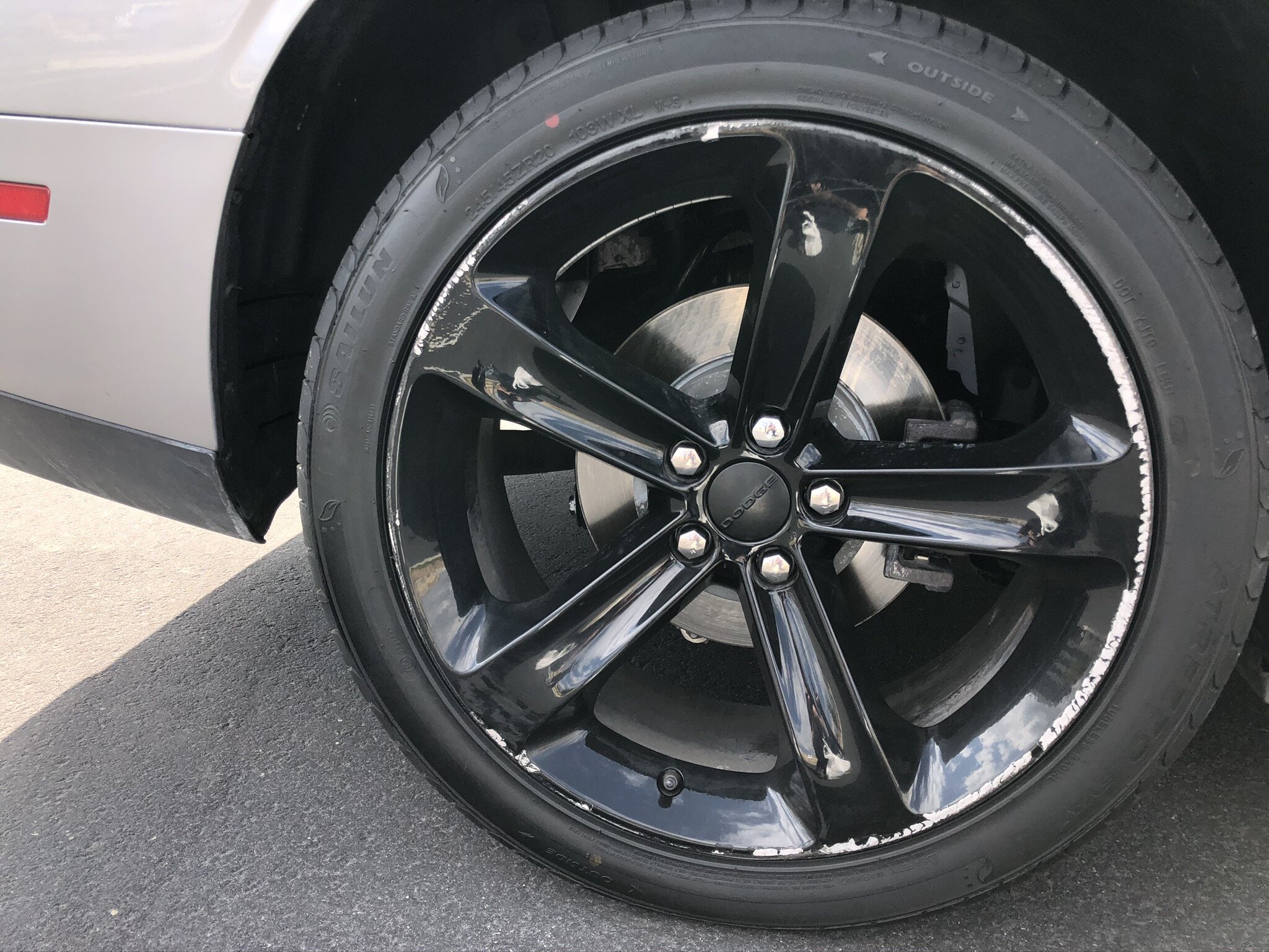 Dodge Challenger before wheel repair -  road curb rash