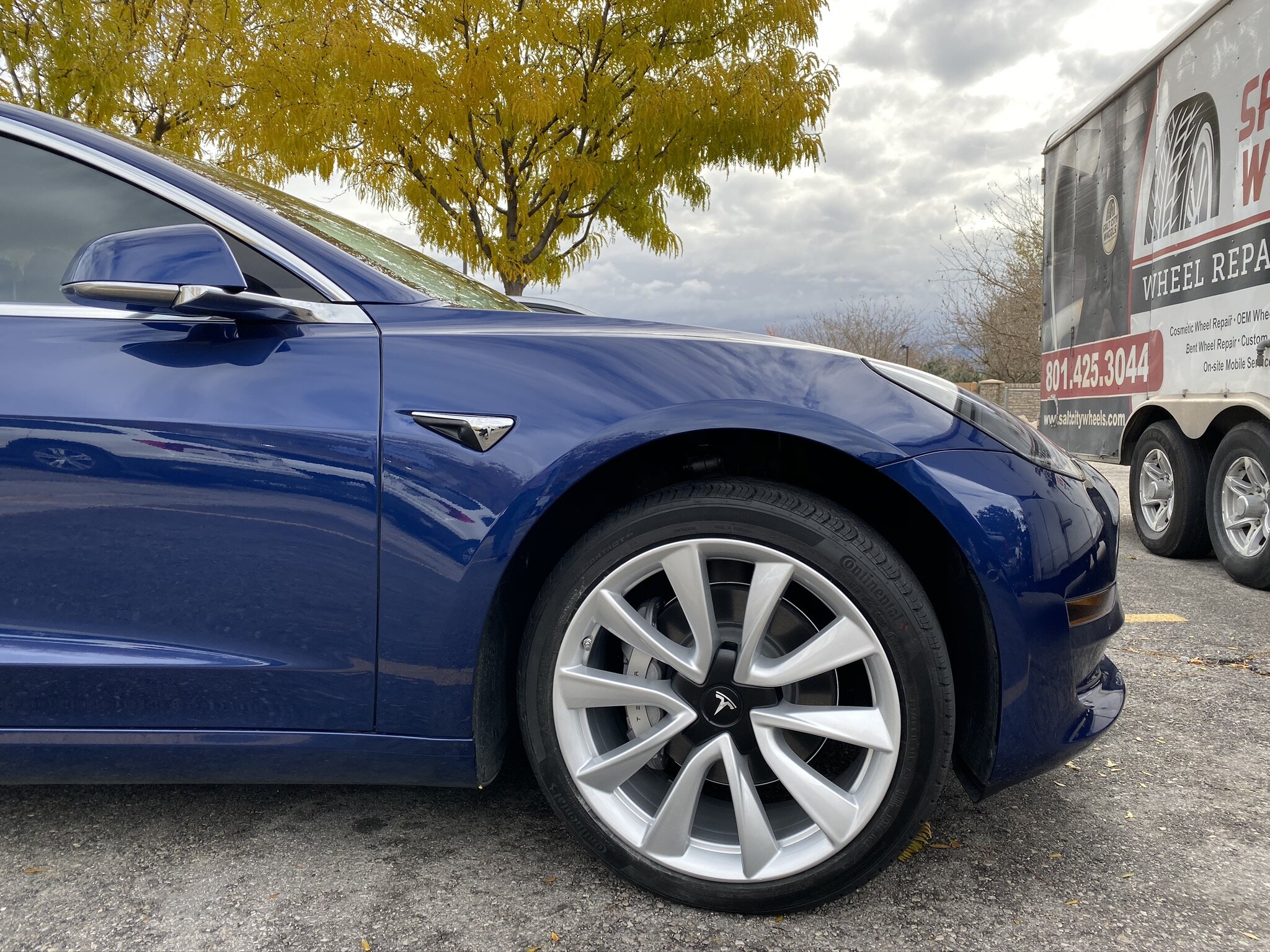Tesla Model 3 after curb rash wheel repair