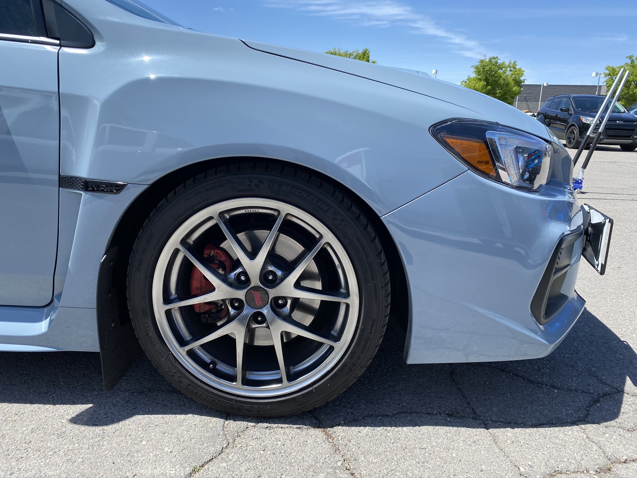 Subaru STI before wheel paint refinish