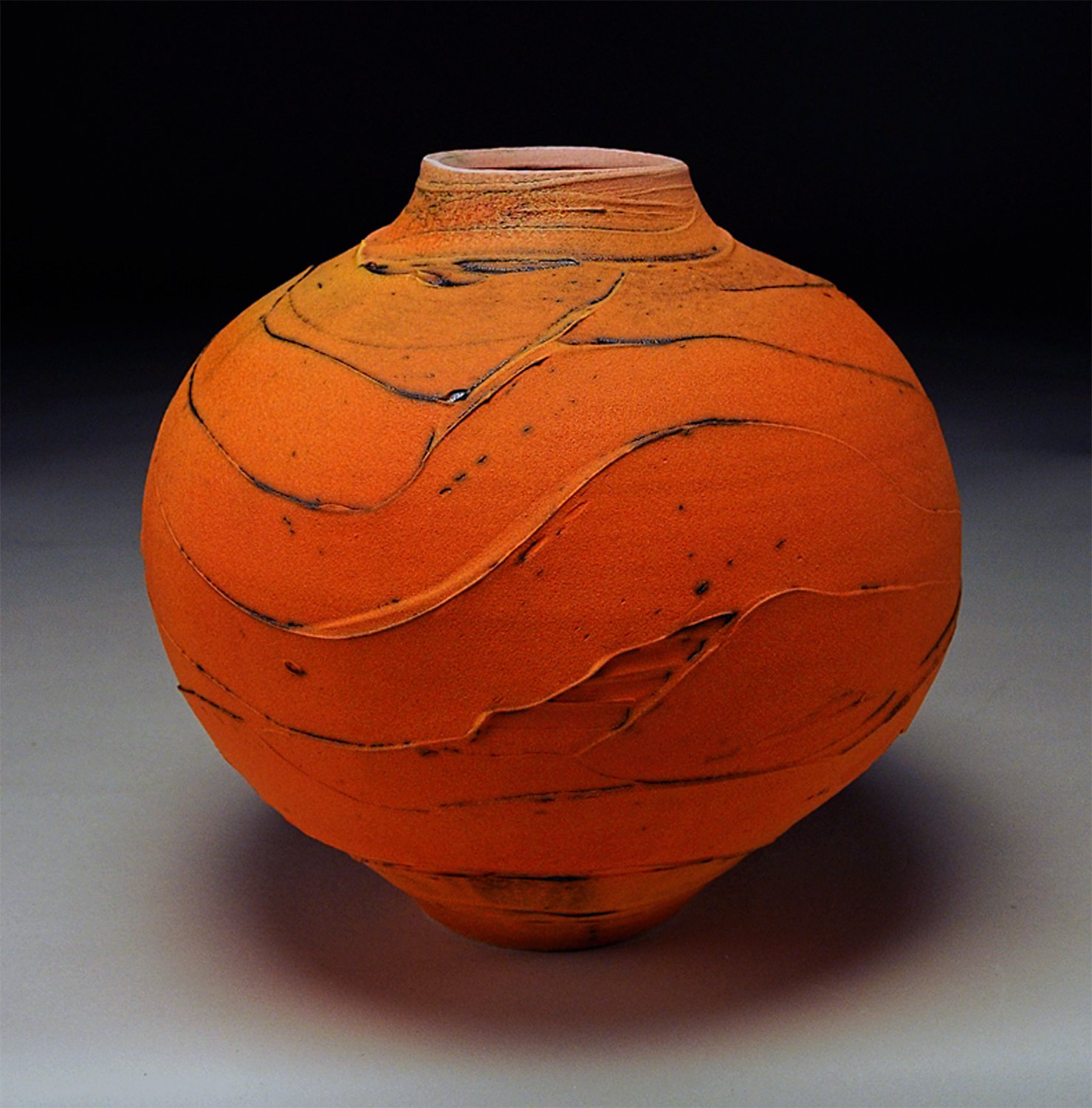 Frosted orange wave vessel.jpg