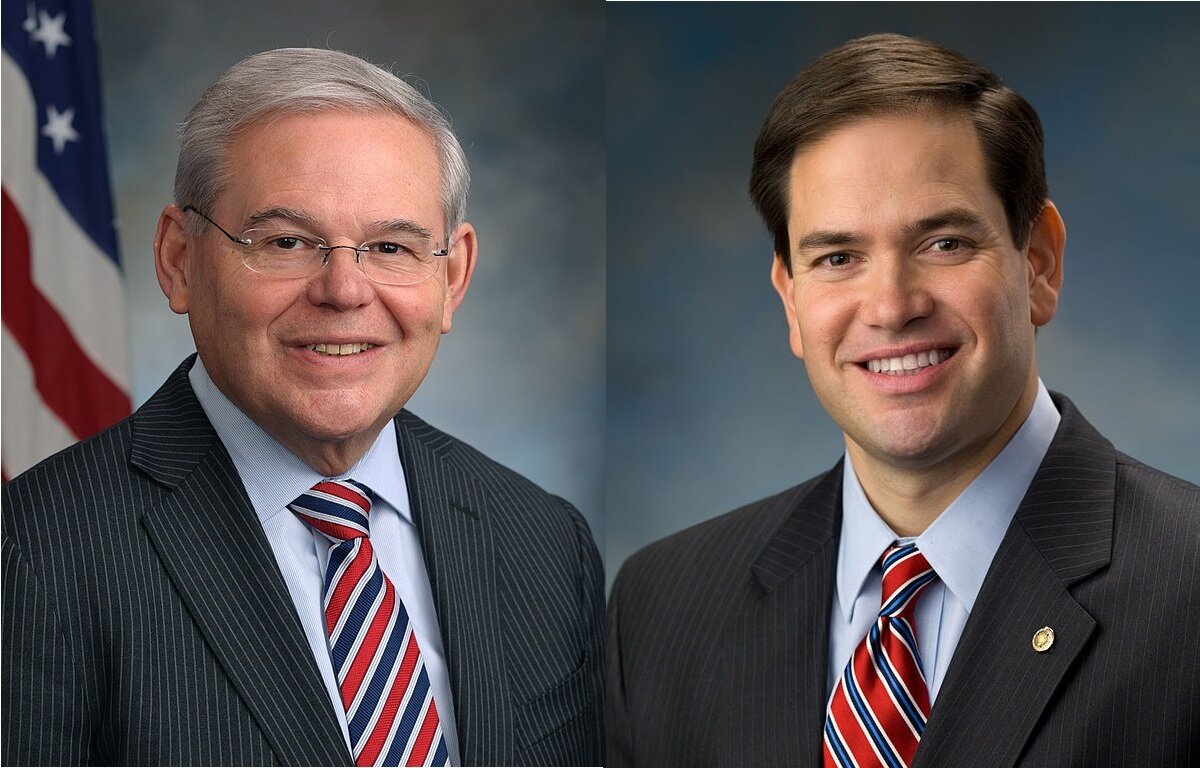 PICTURED: From left to right, Sen. Bob Menendez (D - NJ) and Sen. Marco Rubio (R - FL). Both men are of Cuban heritage, and both support aggressive policy towards Cuba, but particularly Venezuela.