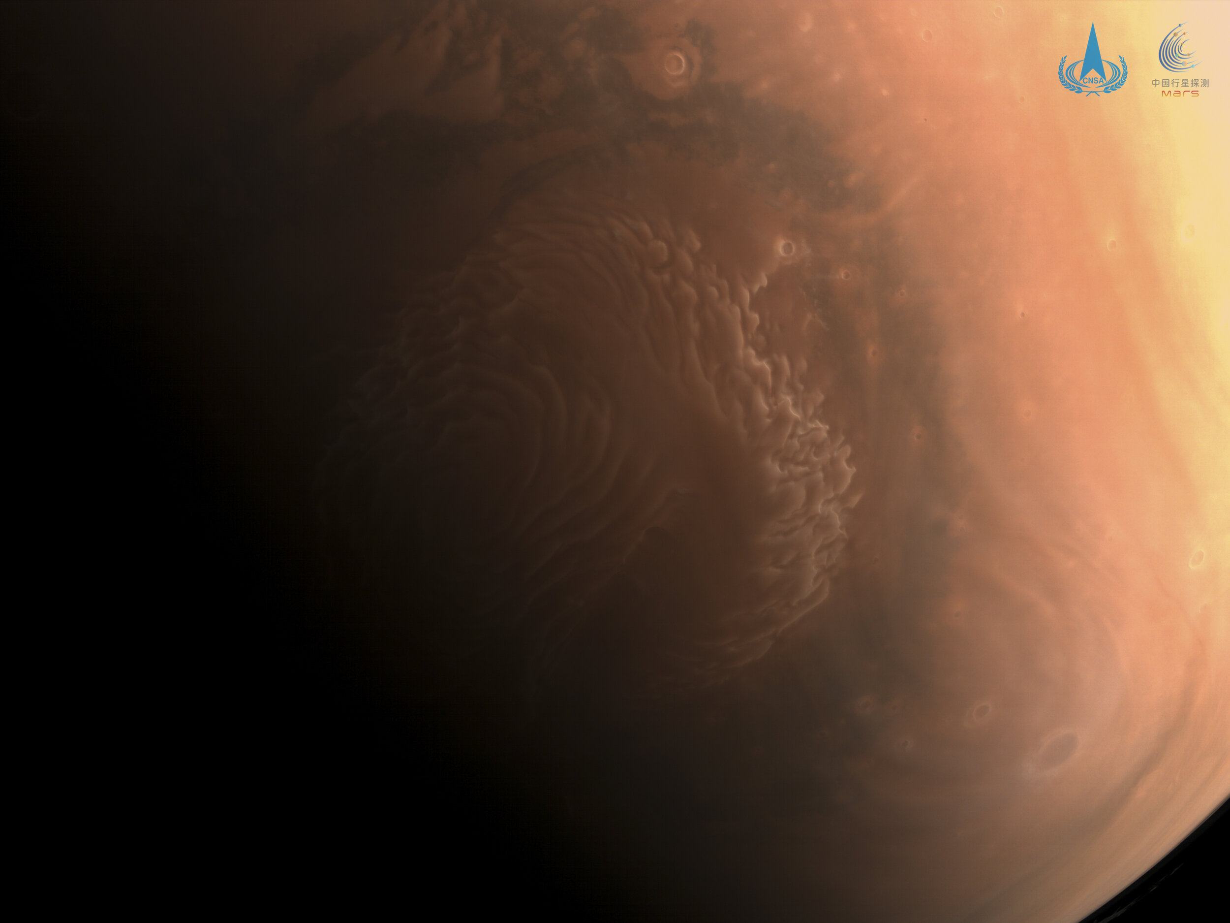 PICTURED: A medium-resolution of the Martian north pole taken from the Tianwen-1 orbiter craft. Photo credit: Chinese National Space Agency (CNSA) and Chinese Academy of Sciences (CAS)