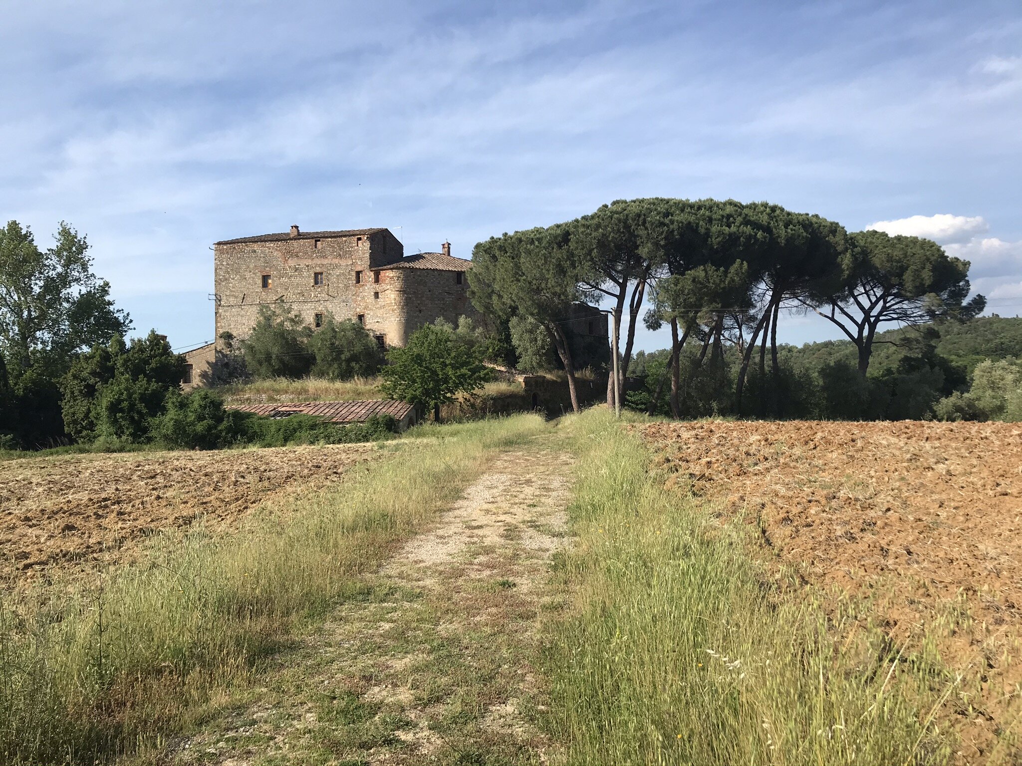  MONTERIGGIONI, Siena, Italy. June 3rd, 2021. PICTURED: A castle first built during the wars between Florence and Siena sits abandoned on a hillside. 