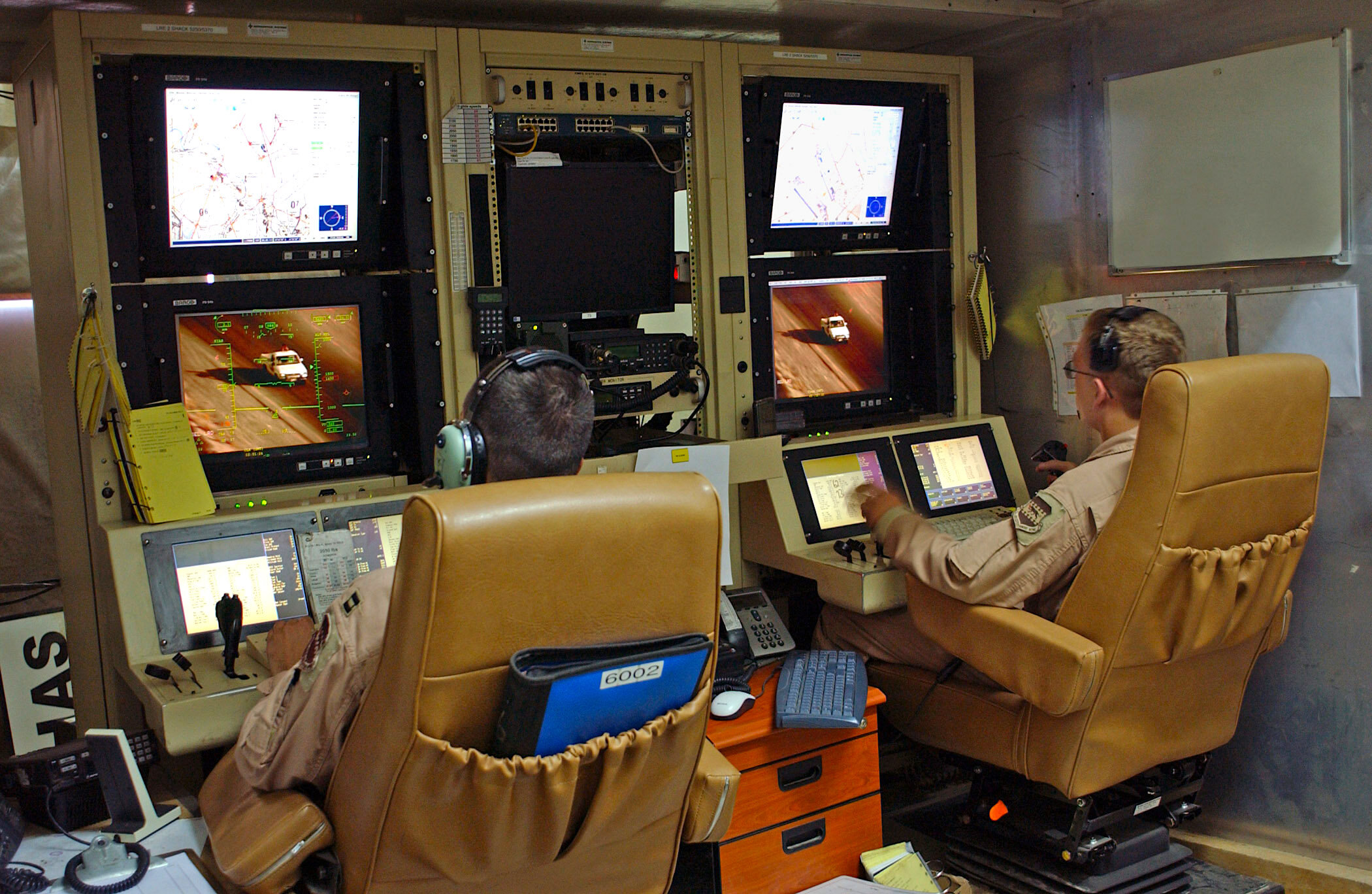 PICTURED: Drone operators at the Balad Air Base in Iraq — a typical environment that can look the same whether in the Middle East or Las Vegas. PC: public domain.