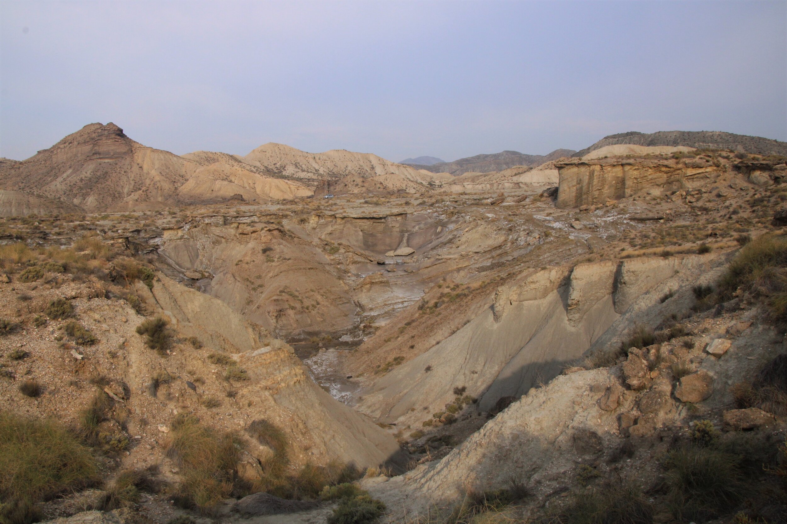   THE TABERNAS, Almeria, Spain. October 2nd, 2021. PICTURED:  A classic Utah-like desert landscape opens up at the top of a “Rambla” or dry riverbed.  Photo credit:  Andy Corbley ©. 