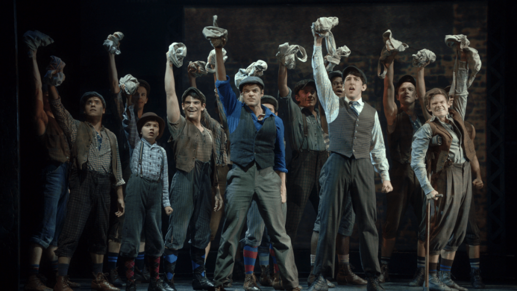 Newsies_LiveShort_Form_ContentBonus_ThumbnailsSong6_TheWorldWillKnowWorldwide-e1495553407854-1024x576.png
