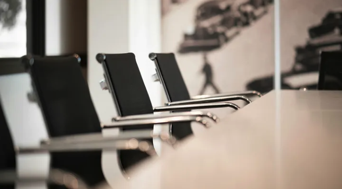 This is an image of chairs in a boardroom where trustees might sit to decide if you pension is secure or not.