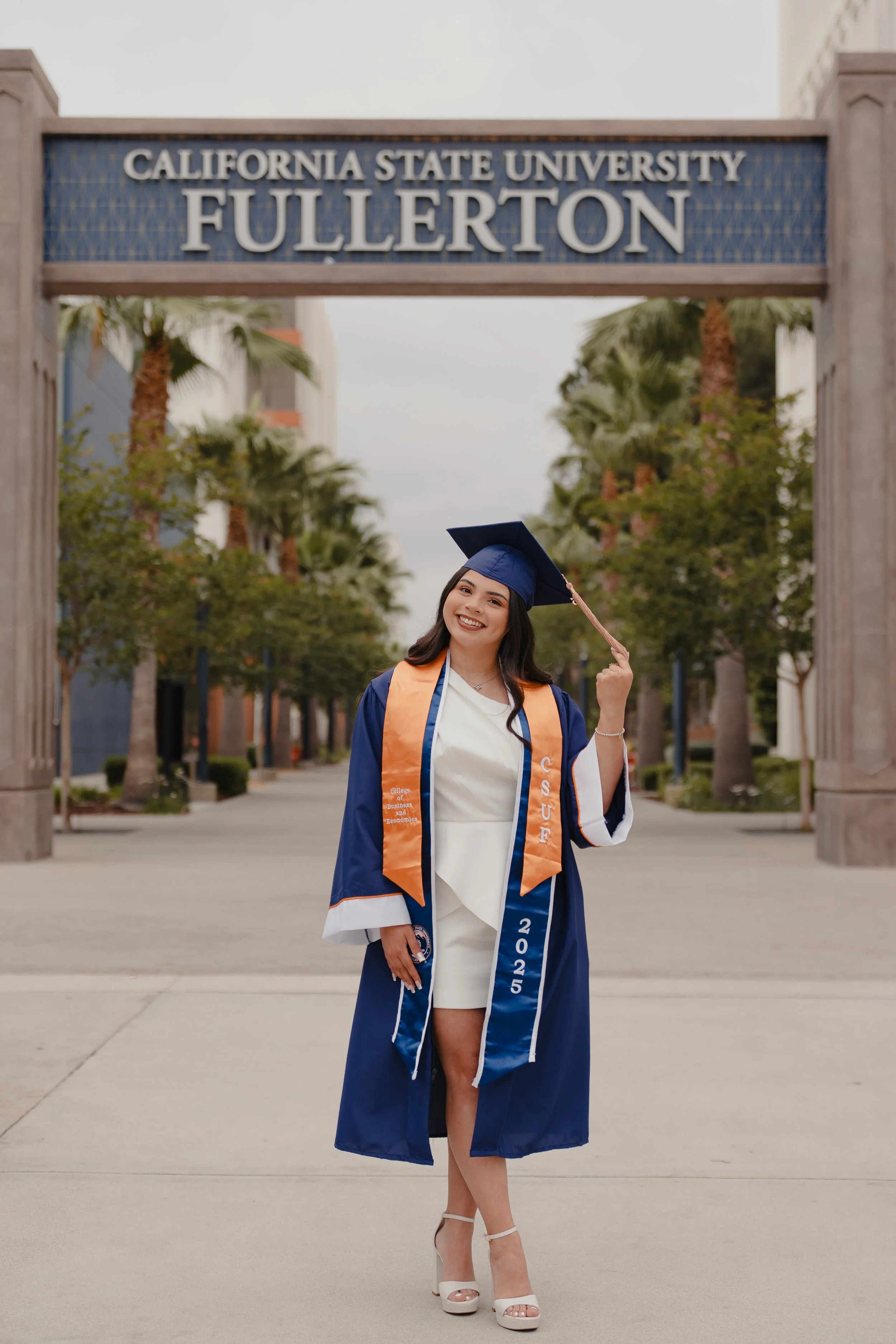 CSUF graduation portrait at California State University Fullerton photographed by Orange County graduation photographer Ray Miranda.