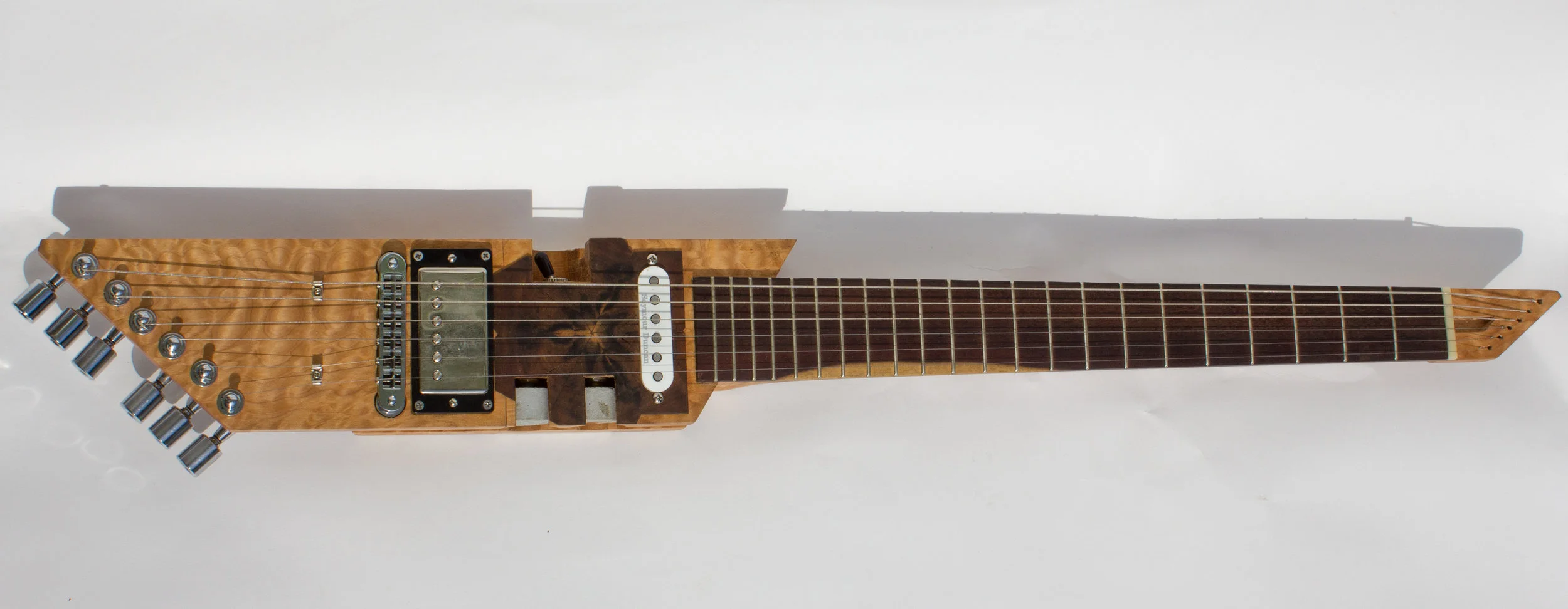 The electric guitar fully working module separates from the body and can easily pack away for a traveling musician