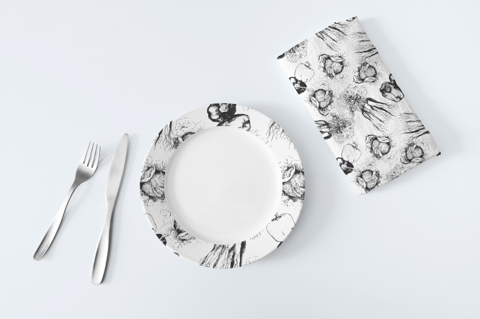 Simple line drawings done in black and white can make an elegant statement on paper goods, plates, fabric, gift wrap or even wall paper.