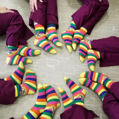 Nurses wearing their Sock Out Cancer socks