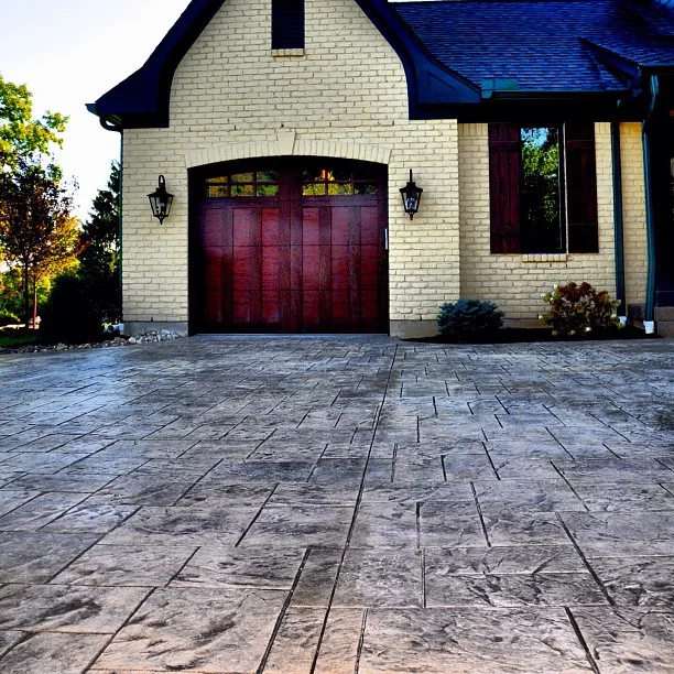Stamped Concrete Driveway, Rear Landing, and Step