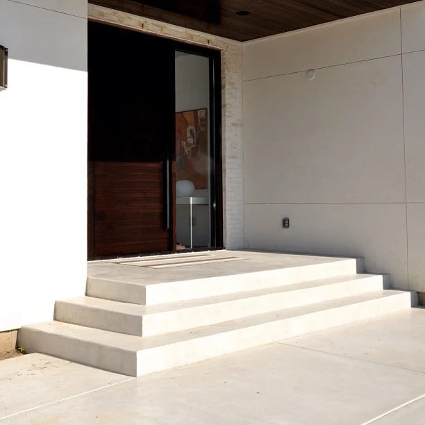 Smoothed Concrete Finish with White Infused Color Front Entryway/Landing, Wraparound Steps, Carriage Area Portion of Driveway