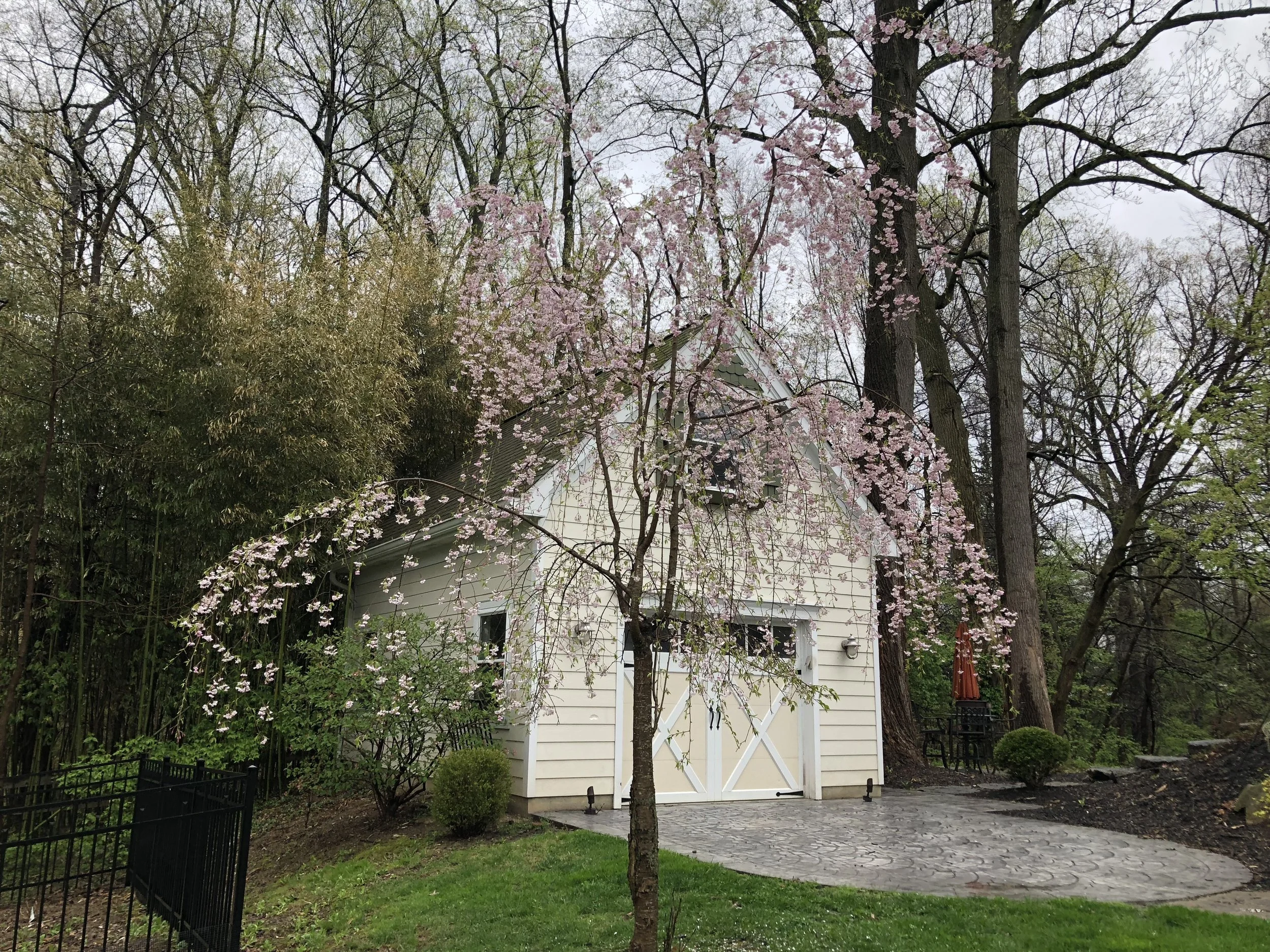 Stamped Concrete Rear Patio/Garage Area with Stone Walkway