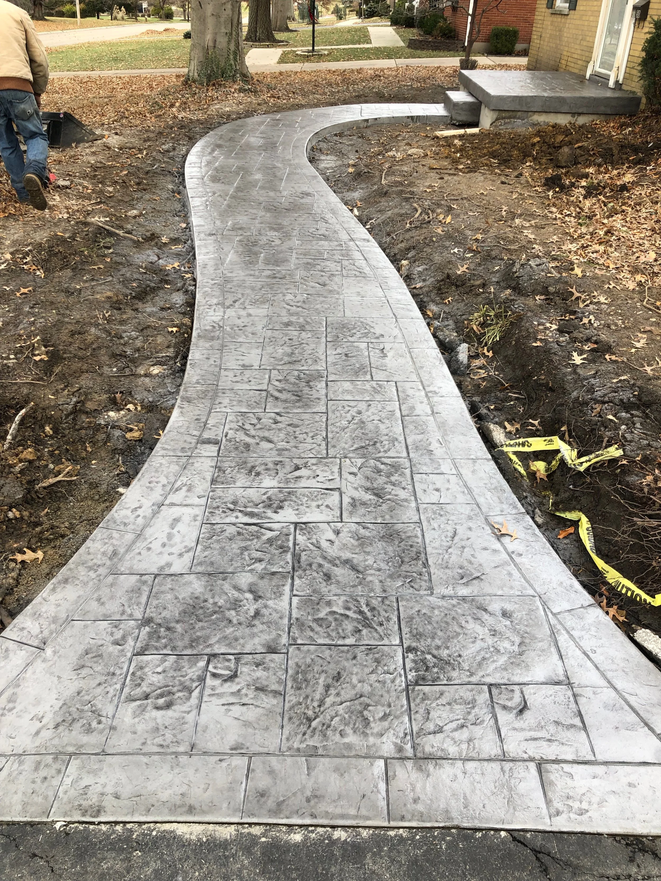 Stamped Concrete Front Walkway, Landing, and Step