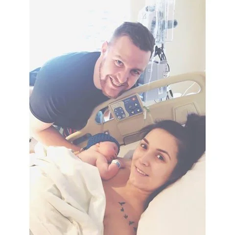 © Brea White. Brea with her husband, Tyler, and baby, Jack.