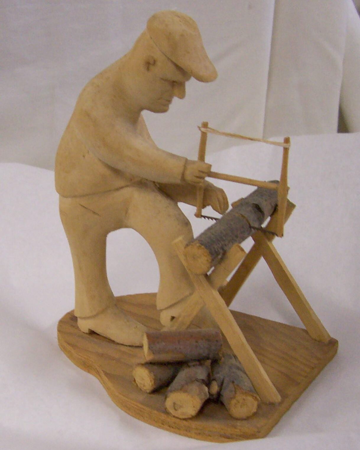 Collection mystery of the day. This amazing carved figure of a man sawing a log is in the ACHS collection. What we know: Melvin A. Nelson lived at 1000 Monroe St in Anoka and carved it. What we don't know: anything else! Who was Melvin? Do more of hi