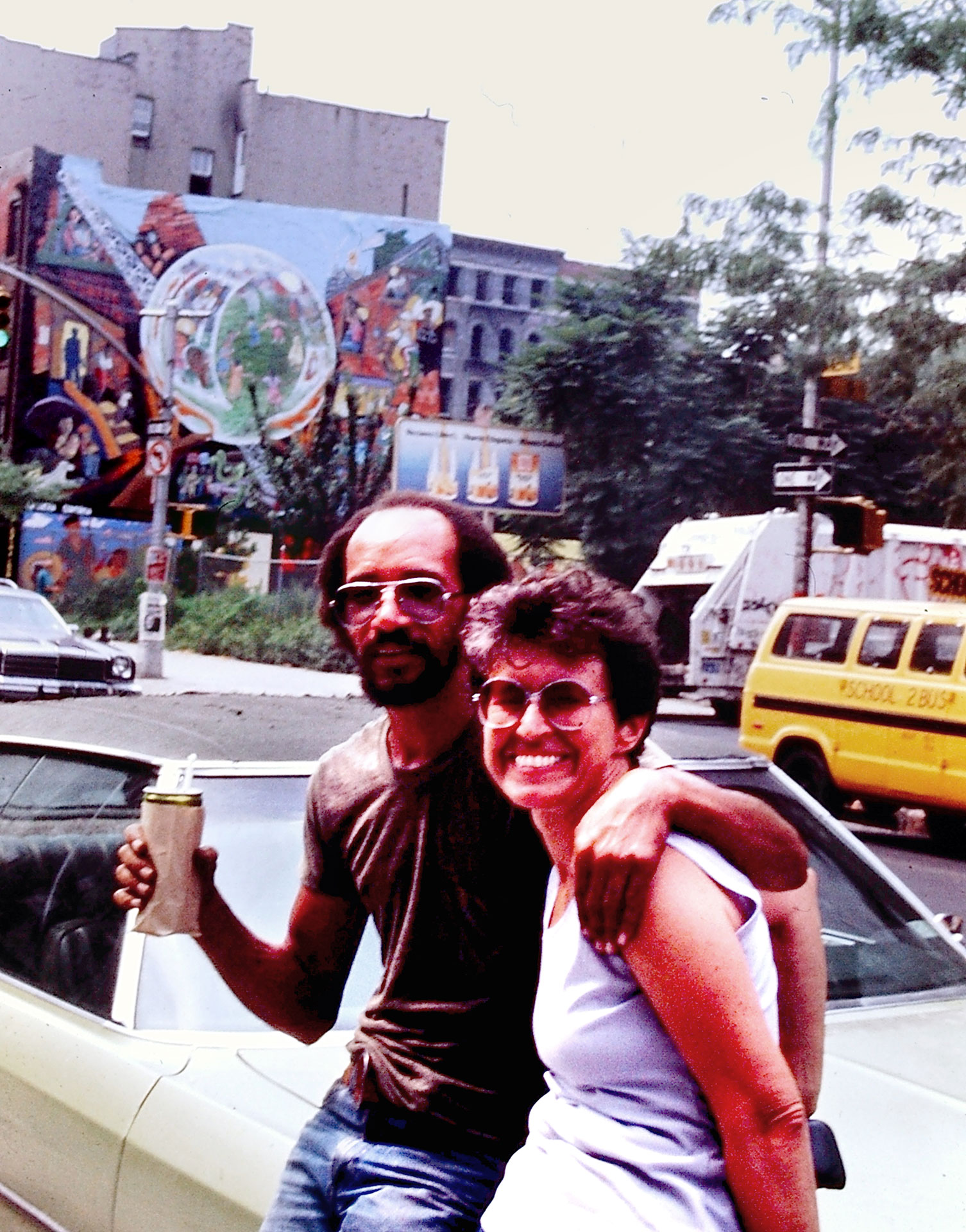   Joe Stephenson and Eva Cockcroft relaxing on NE corner of Avenue C and East 9th Street   Photo © Camille Perrottet  