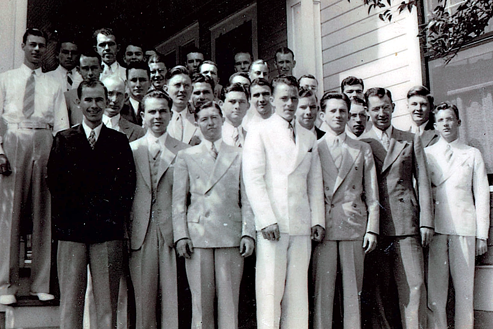 In September 1924, Tom Renfro and his former roommate Howell Cobb moved to Austin to enroll in the University of Texas Law School. Both were recent graduates of Howard Payne College in Brownwood, and Renfro had been elected to represent his district for the 1925 state legislative session. Like scores of freshmen before them, they lived in old B-Hall for their first semester. Later, they moved to a private residence in North Austin. Although adequate, the living arrangements were far from ideal, and Renfro began to develop a new idea. He described this vision to Cobb in the following words: “We’ll establish a club on this campus composed of men whom we believe to be honorable and with whom we would like to associate as friends while in school and after we leave campus.” Cobb was receptive to this idea, and the two began recruiting friends to be in their club. In a short time, they found six students who they thought would be appropriate for their club. As for living arrangements, they found a location above a dry cleaning shop located just south of the law school. The eight members began to call themselves the Tejas and referred to each other as braves, with the intention of emulating the friendliness of the East Texas Indians. Throughout the spring and summer, they continued to recruit new braves. By the end of September, there was a total of nineteen Tejas braves. Many were fellow law students, but there were also representatives from other colleges. On September 27, 1925, the braves held their first official meeting at the Stephen F. Austin Hotel. Renfro was elected president, an office he would keep for the first two years. The following year the club was asked to join the Interfraternity Council. The club chose to remain independent from the Greek system, and has remained so ever since. As the club expanded, it soon outgrew its home above the dry cleaners. By 1927, the Club had moved to a new place of residence on 1907 Nueces. In 1928, the club moved for a third time to a house on 307 West 26th Street. (This is currently the location of the U.T. Communications Building.) This would be the home of the Tejas Club for the next eighteen years.