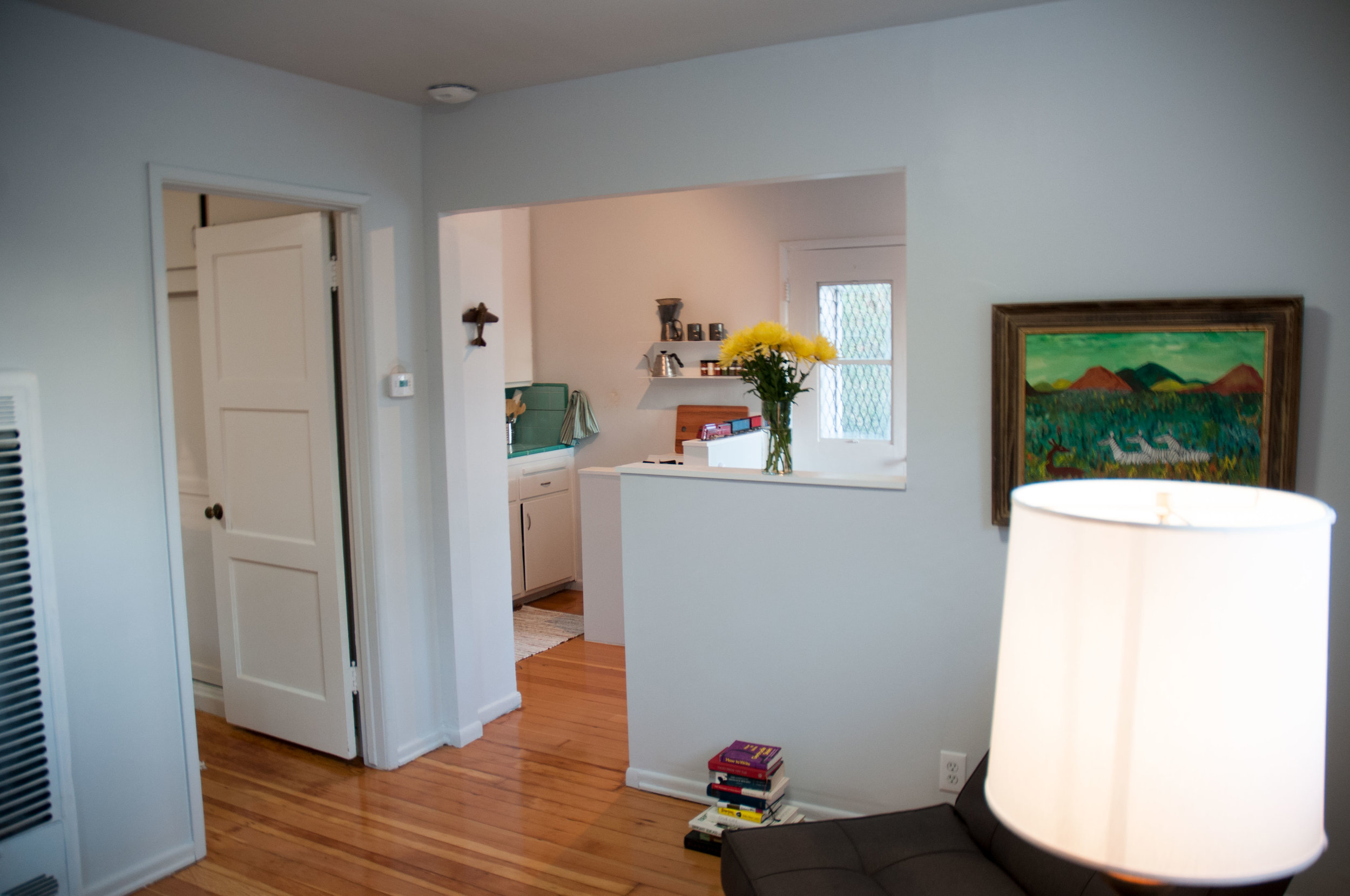 A cutout was made in the kitchen area to allow light into the living area and create symmetry with the layout of the kitchen.