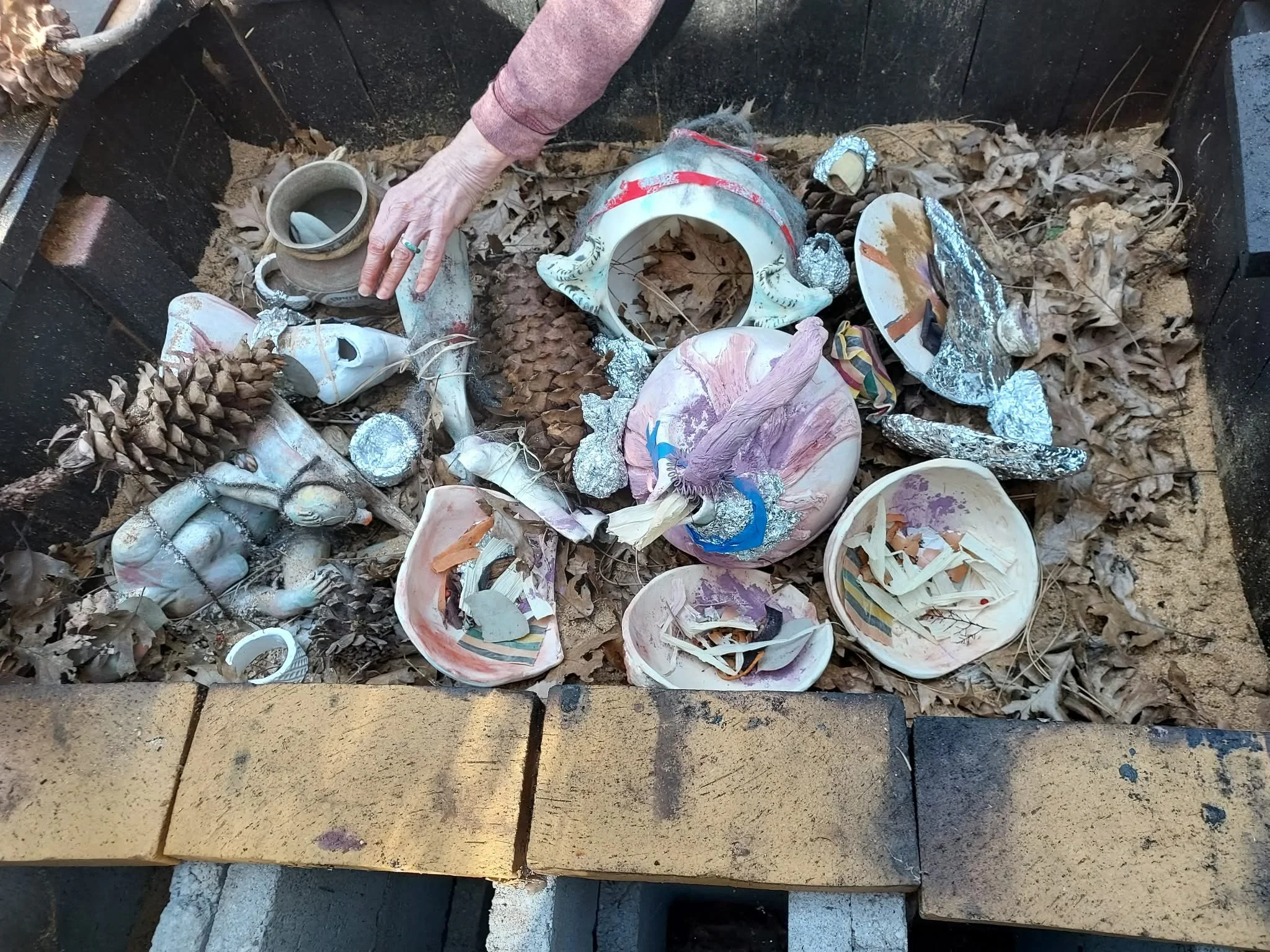 Pit firing process.