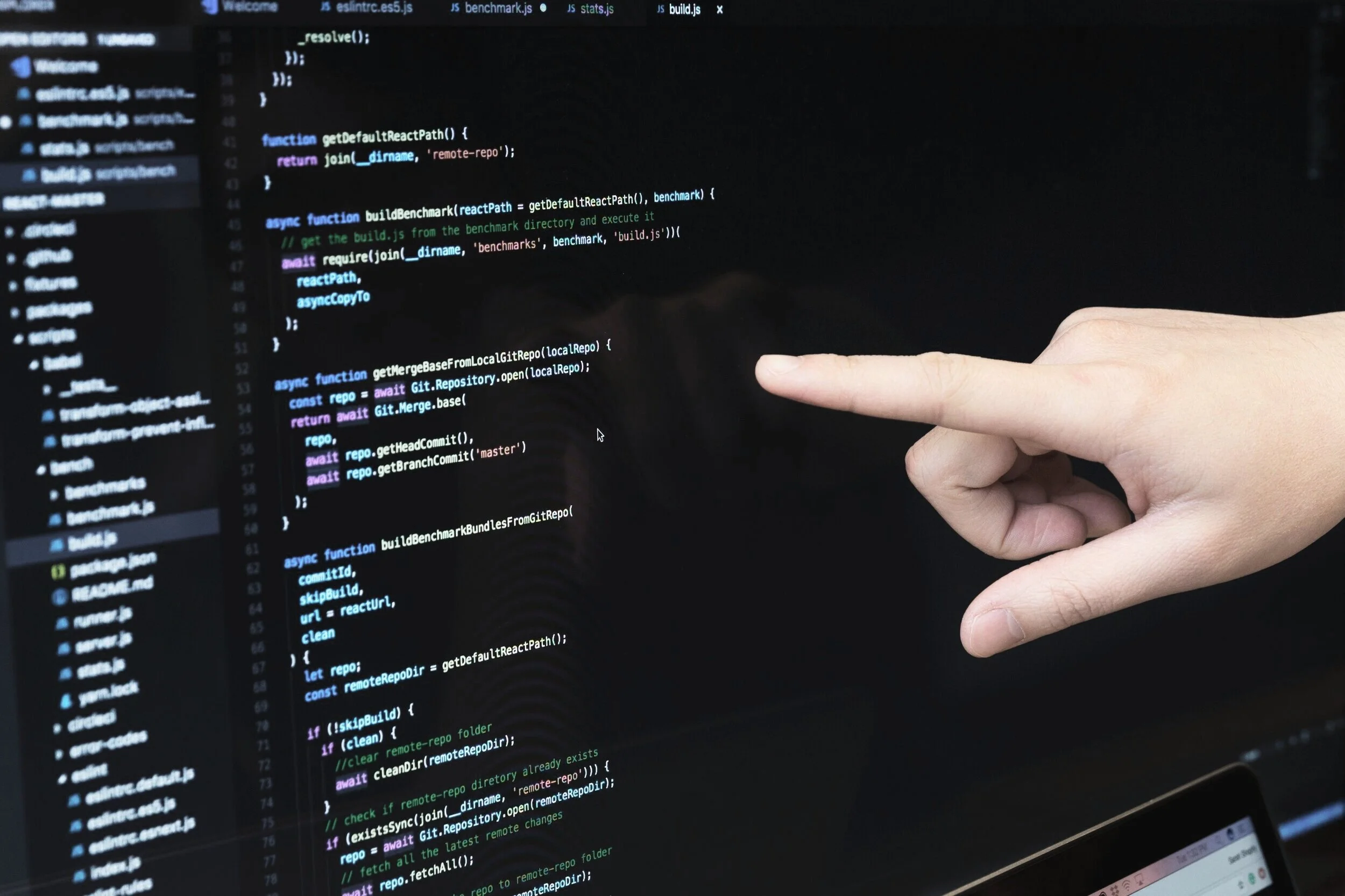 finger-pointing-at-javascript-code.jpg