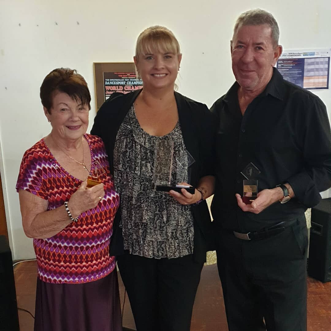 Ron, Maureen and Shorna with their medals congratulations.