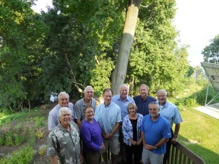 In December, 2010, the Alliance Board met for the first time. The founding Board members, pictured in the back row, were Phil Cianciotto (Seneca Lake Pure Waters Association), Jim Barre (formerly of Keuka Lake Association), Bill Ayling (Otisco Lake Association) James Beckwith (Owasco Watershed Lake Association), George Coolbaugh (Conesus Lake Association), and Jack Schickler (Conesus Lake Association). In the front row is Hugh Turner (Honeoye Valley Association), Hilary Lambert (Cayuga Lake Watershed Network), Lynn Thurston (Canandaigua Lake Watershed Association) and Mark Morris (Keuka Lake Association). Missing from the photo is Robert Werner (Skaneateles Lake Association).
