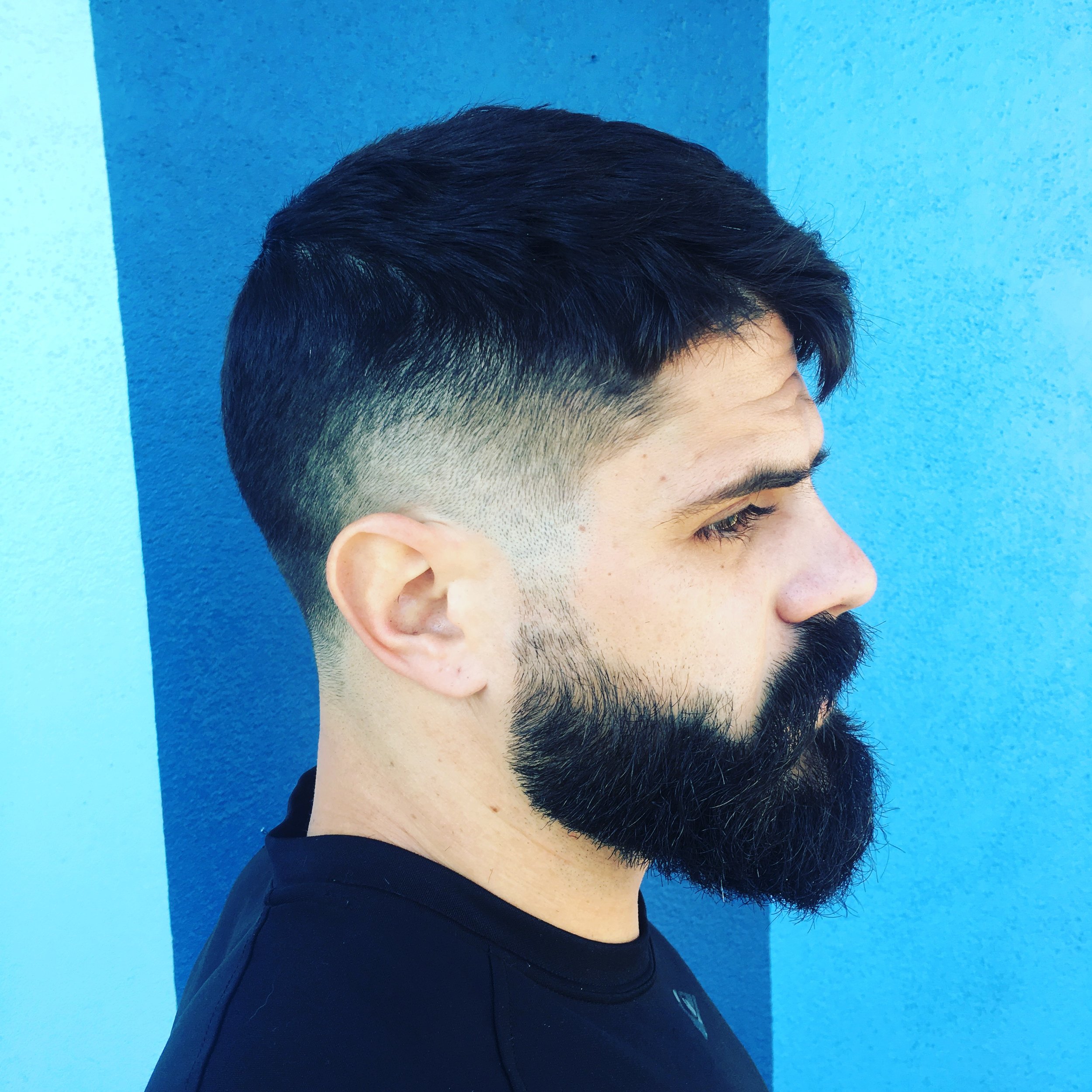 Men's zero fade haircut and beard trim.
