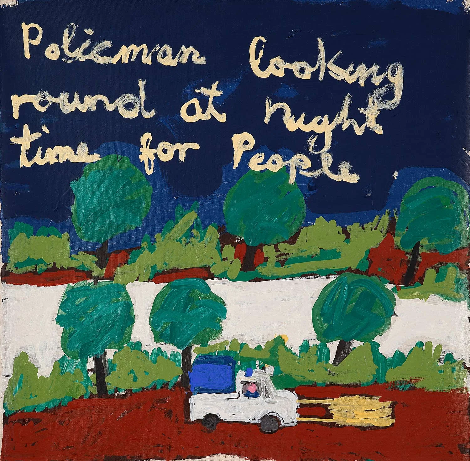 Policeman looking round at night time for people