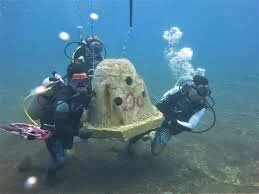 divers carrying stuff.jpeg