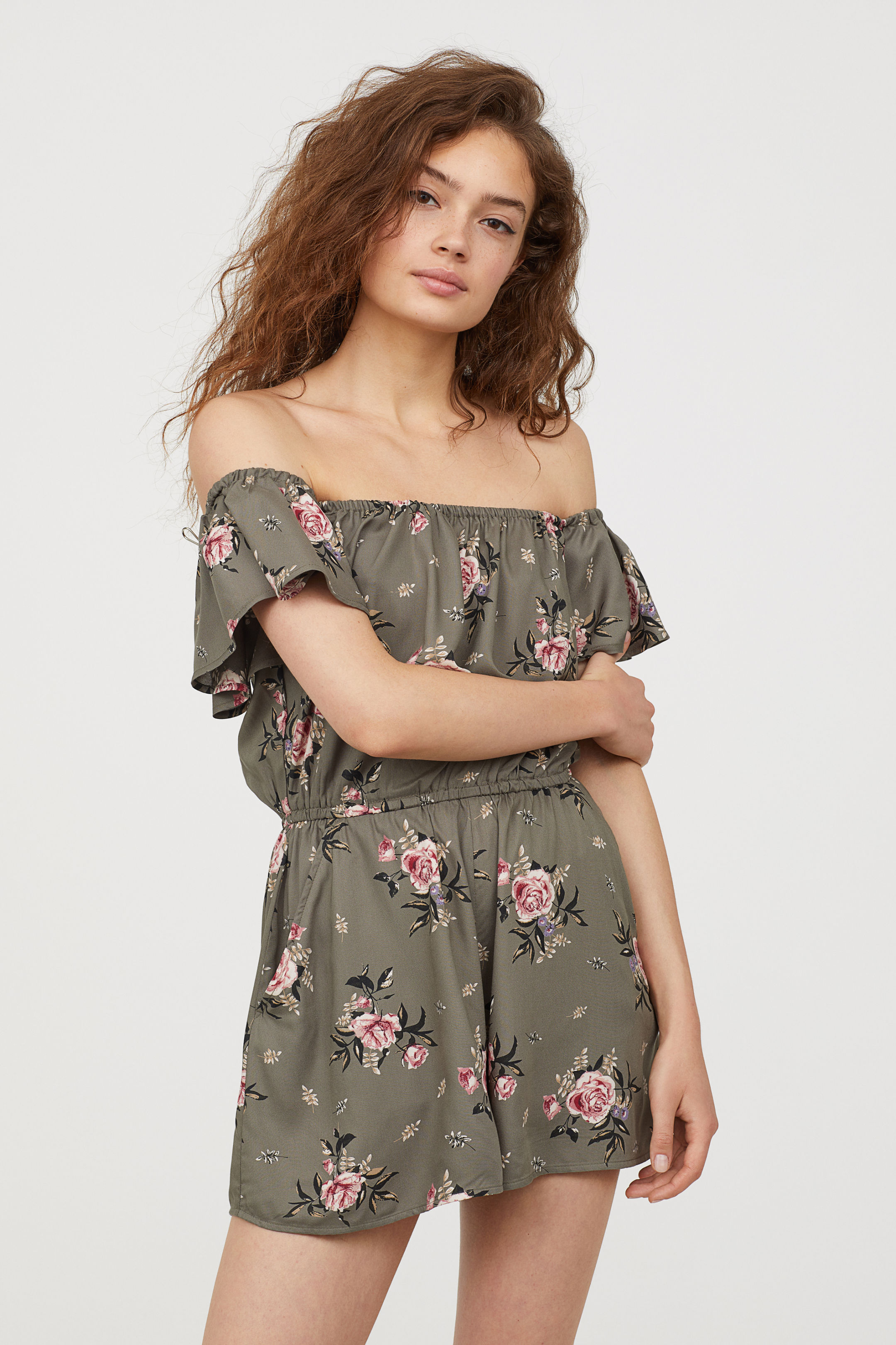 Woven off shoulder jumpsuit with frilly sleeve shape 