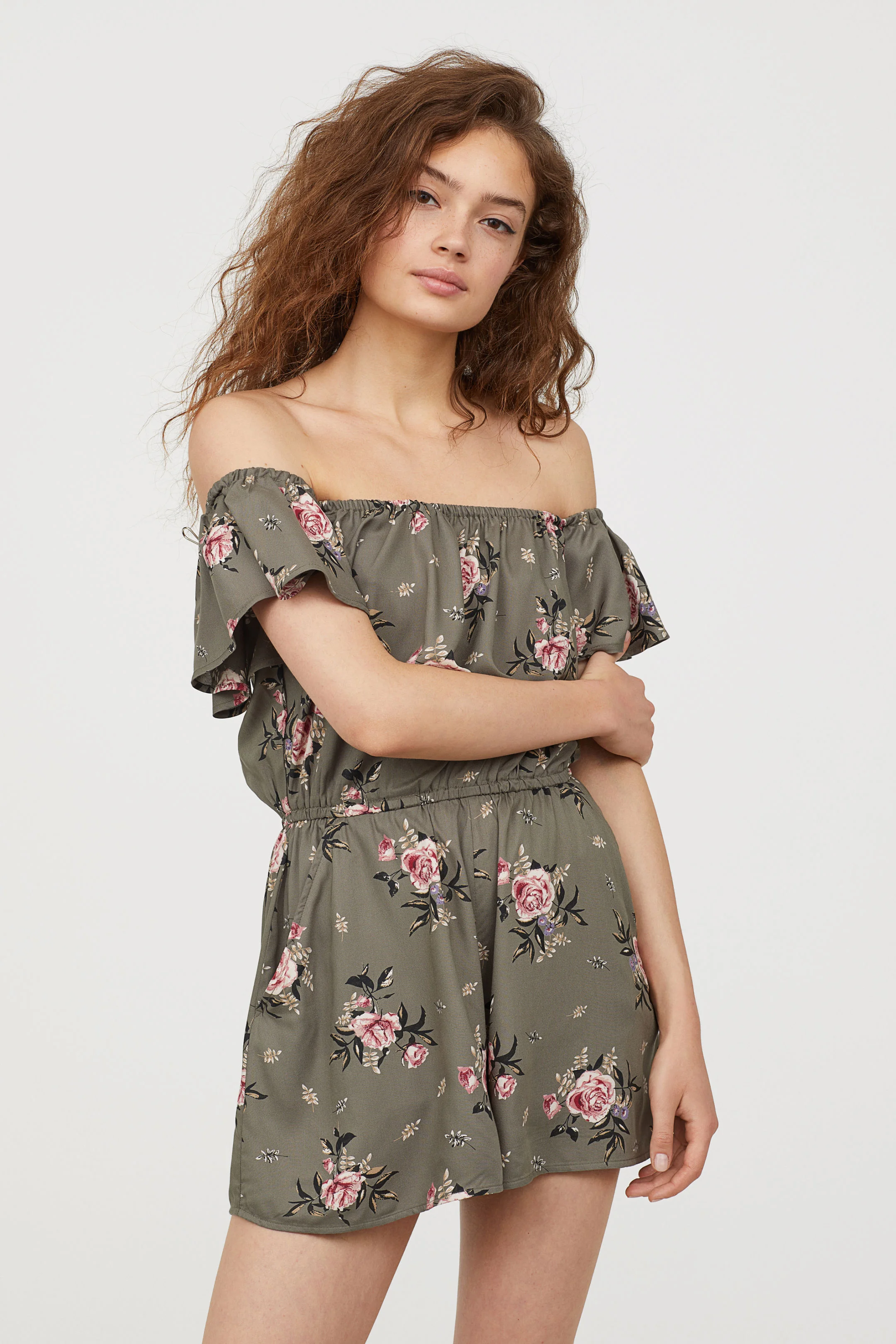  Woven off shoulder jumpsuit with frilly sleeve shape 