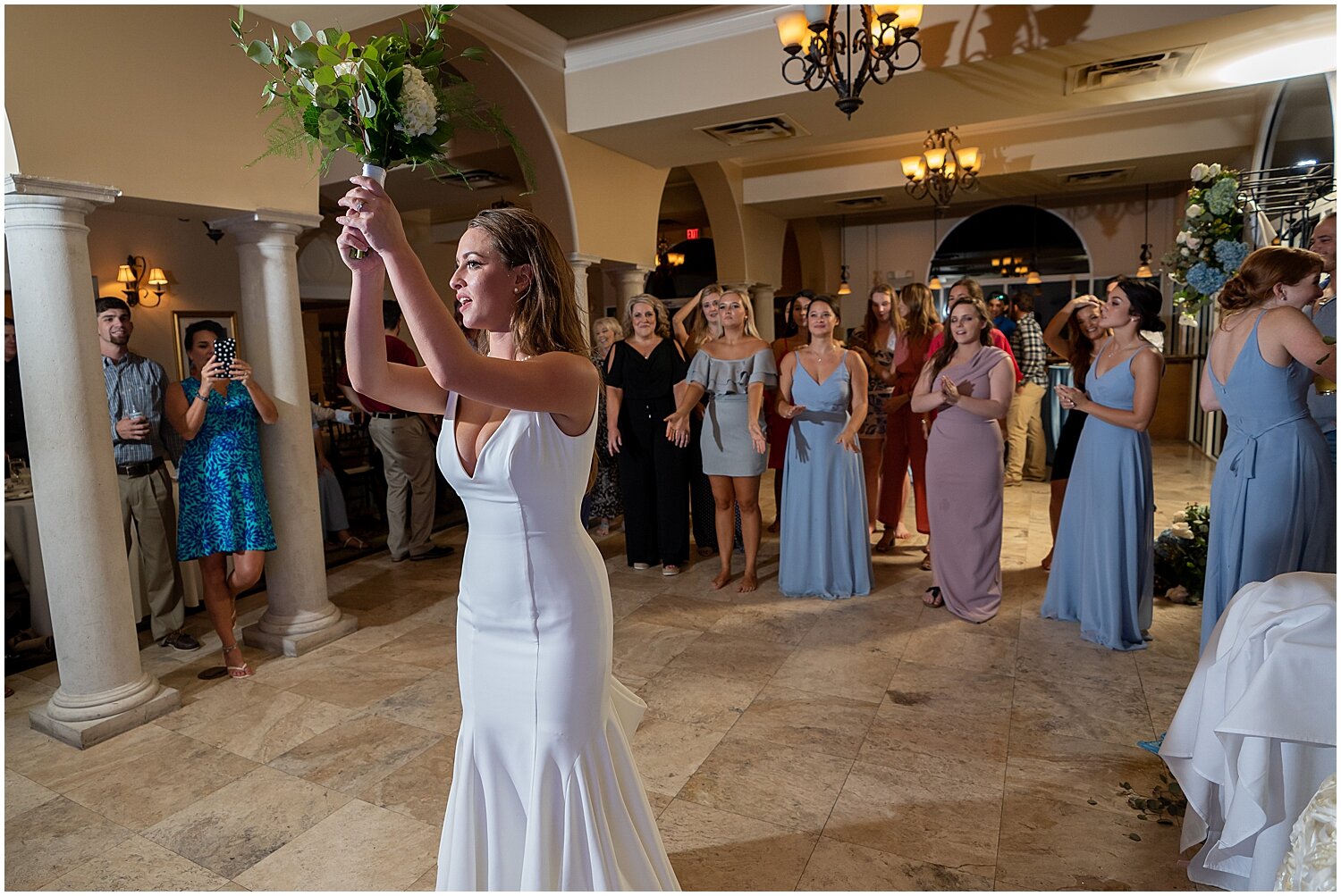  bride throwing her bridal bouquet 