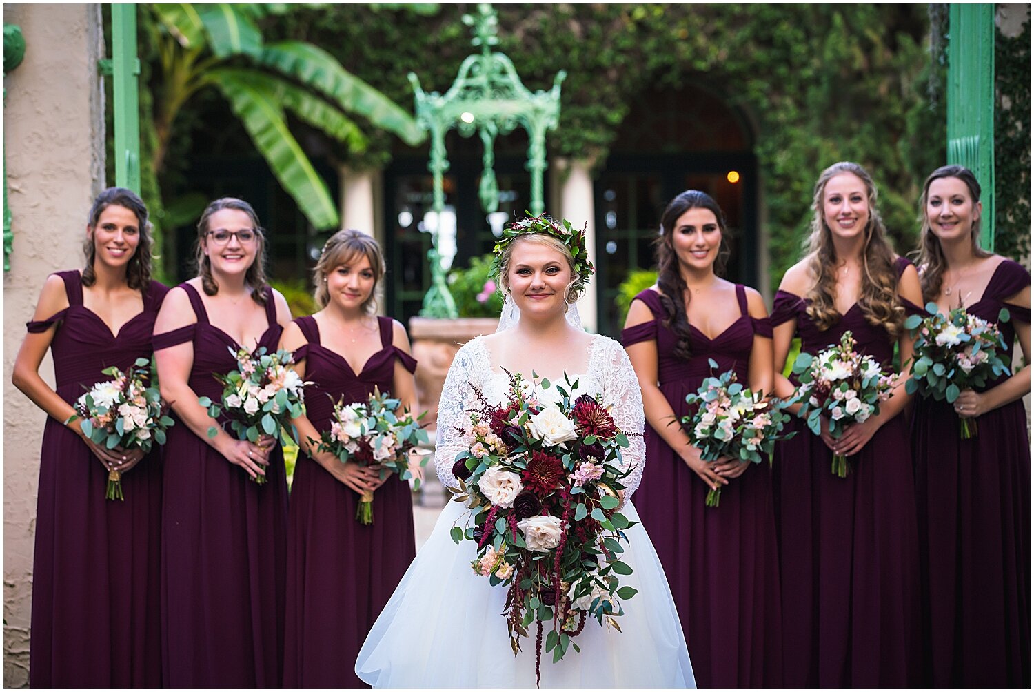  bride and bridesmaids holding their wedding bouquets 