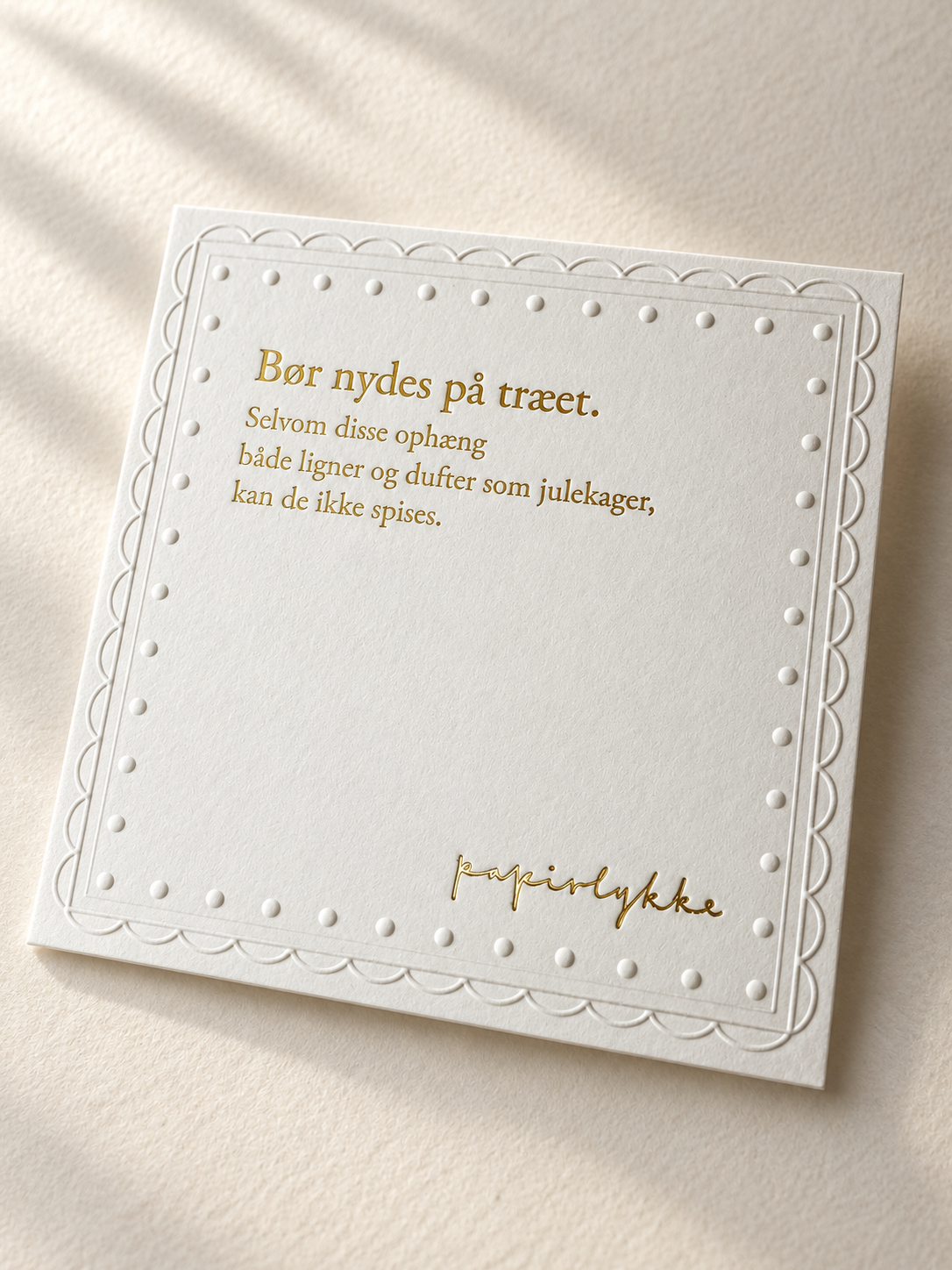 PapirlykkeJul2026_Indlægskort.jpeg