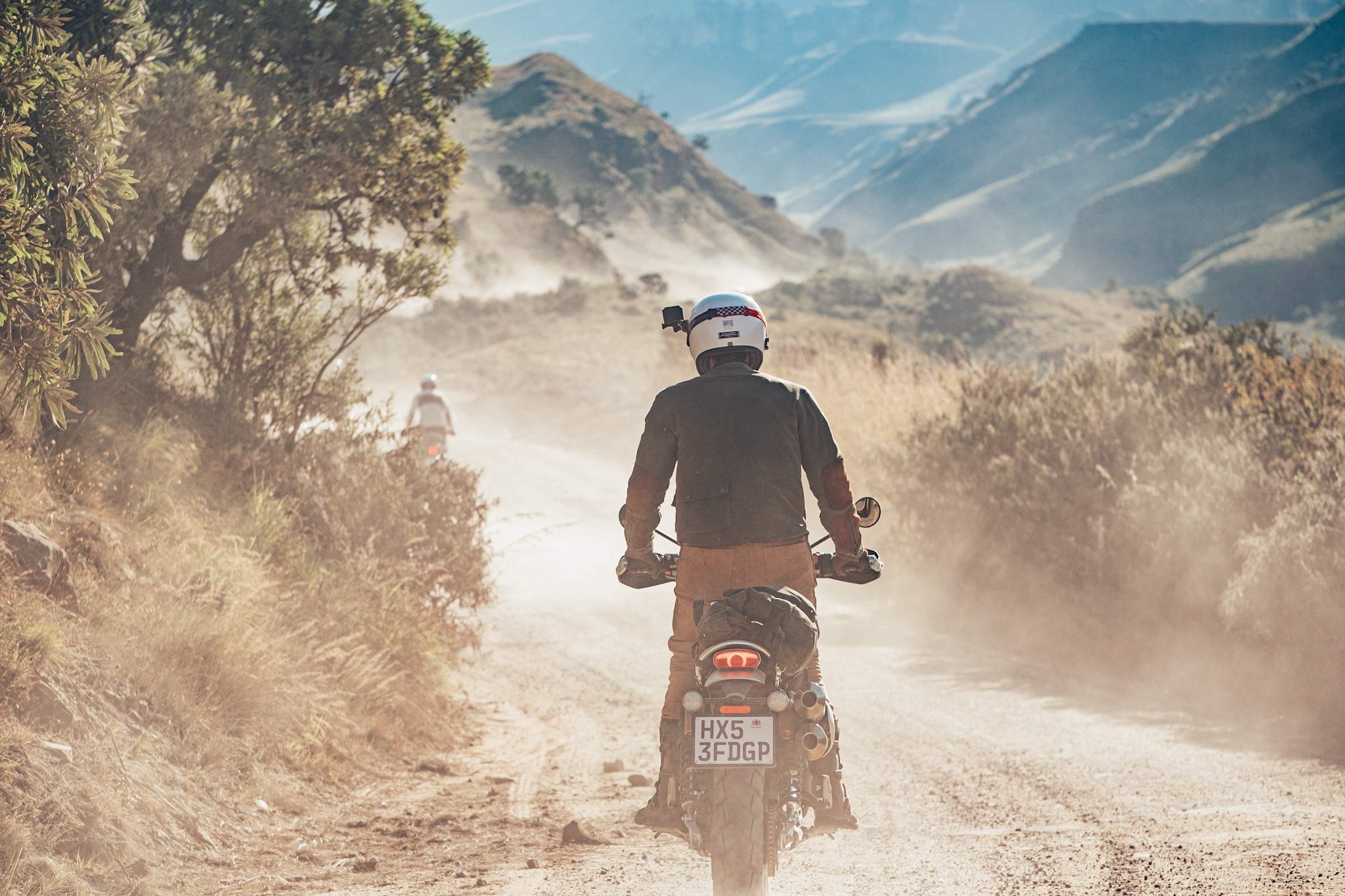 Isidoro from Fuel Motorcycles on the way up Sani Pass with Bonafide Moto Co.