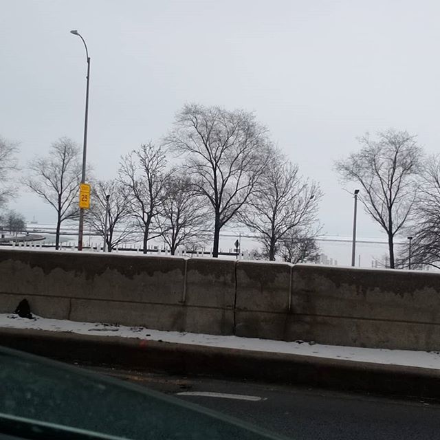 Lake Michigan is so white it looks like it melts into the sky extending it. As if the land just drops off into cliff-like nothing.
Other times it looks like how I imagine Antarctica looks. Just a forever extending land of frigid snow and ice.

It's t