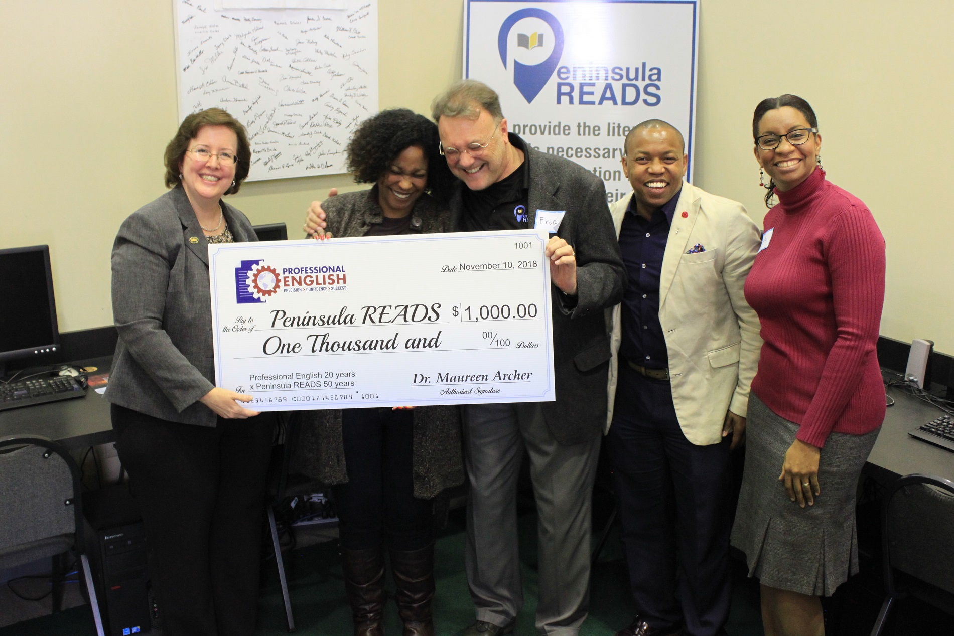 Check Presentation to Peninsula Reads.jpg