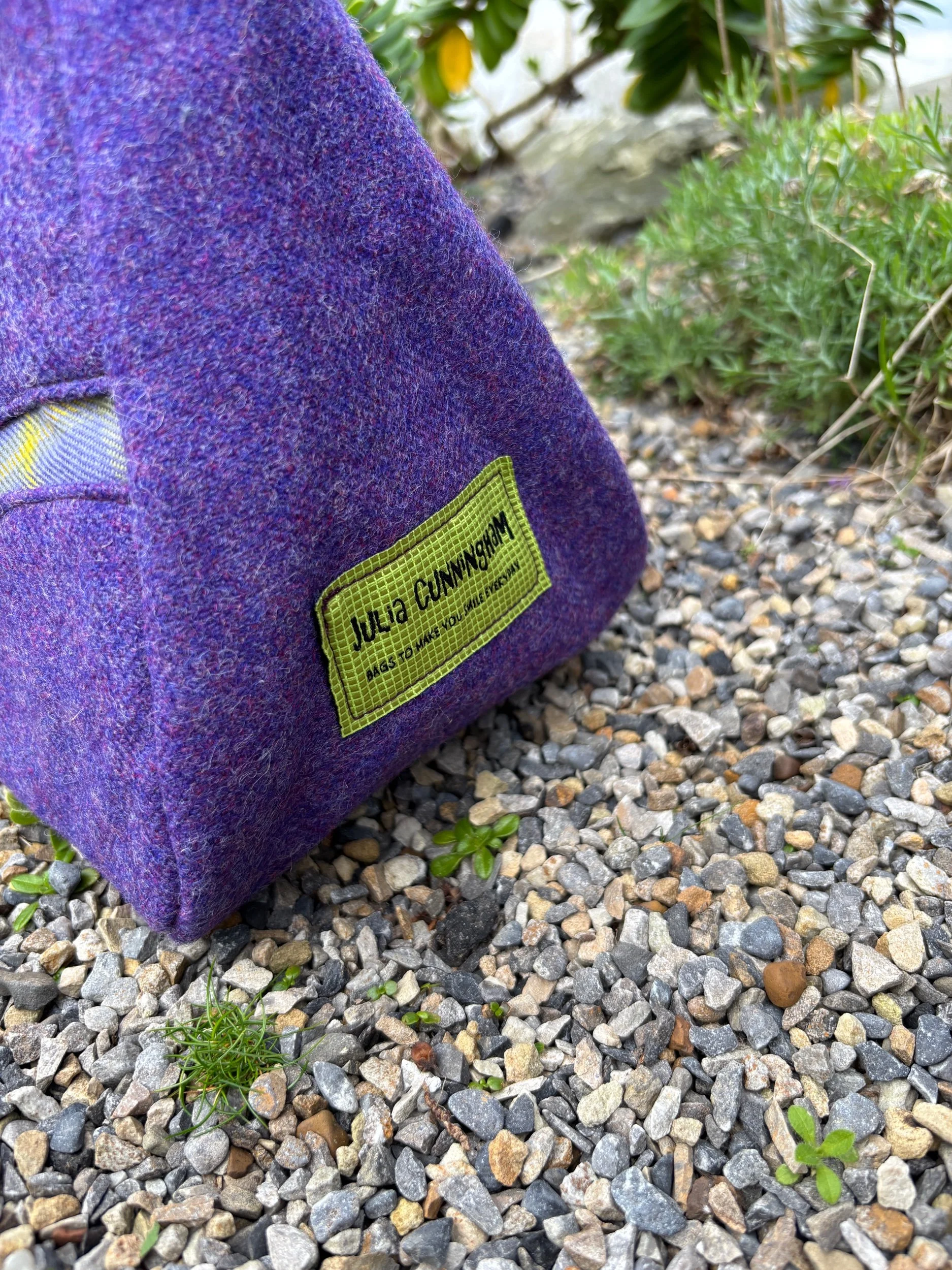 label details Handmade Scottish Muckle Fantoosh tartan and purple tweed handbag for weddings and special occasions by Julia Cunningham