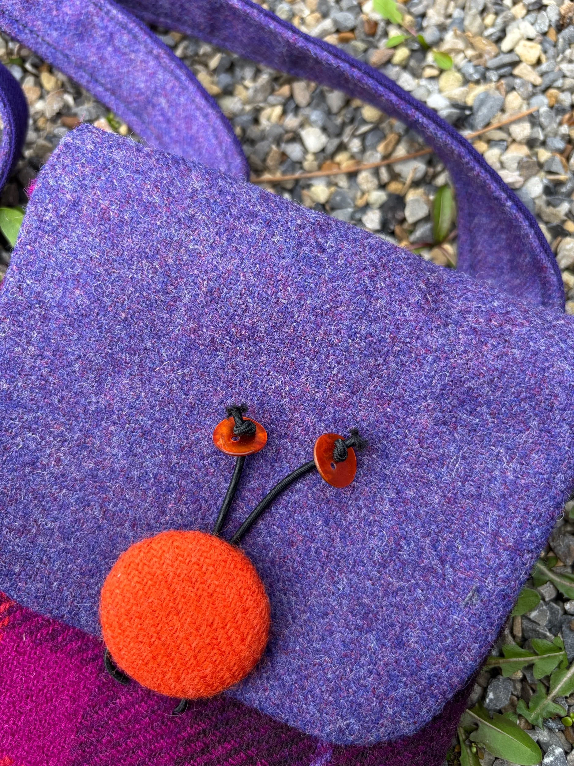 Fixed length purple tweed strap and shell button detail on handmade Scottish Harris tweed crossbody bag by Julia Cunningham