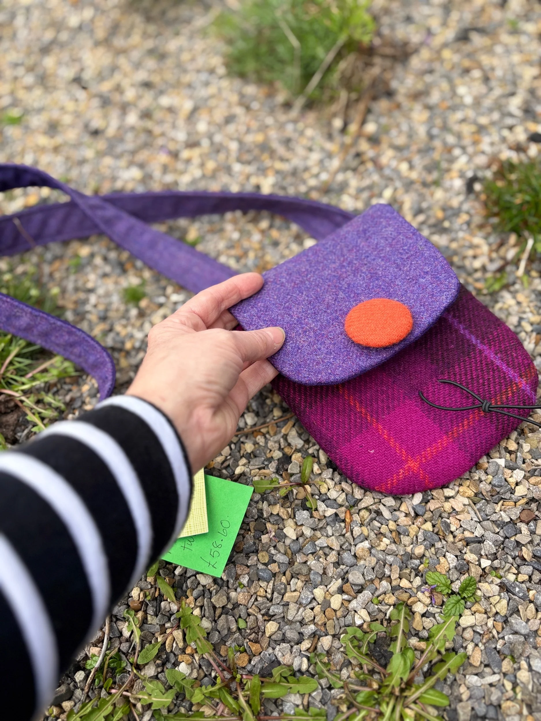 Handmade purple pink and orange Harris tweed crossbody phone bag worn hands-free, designed by Scottish maker Julia Cunningham