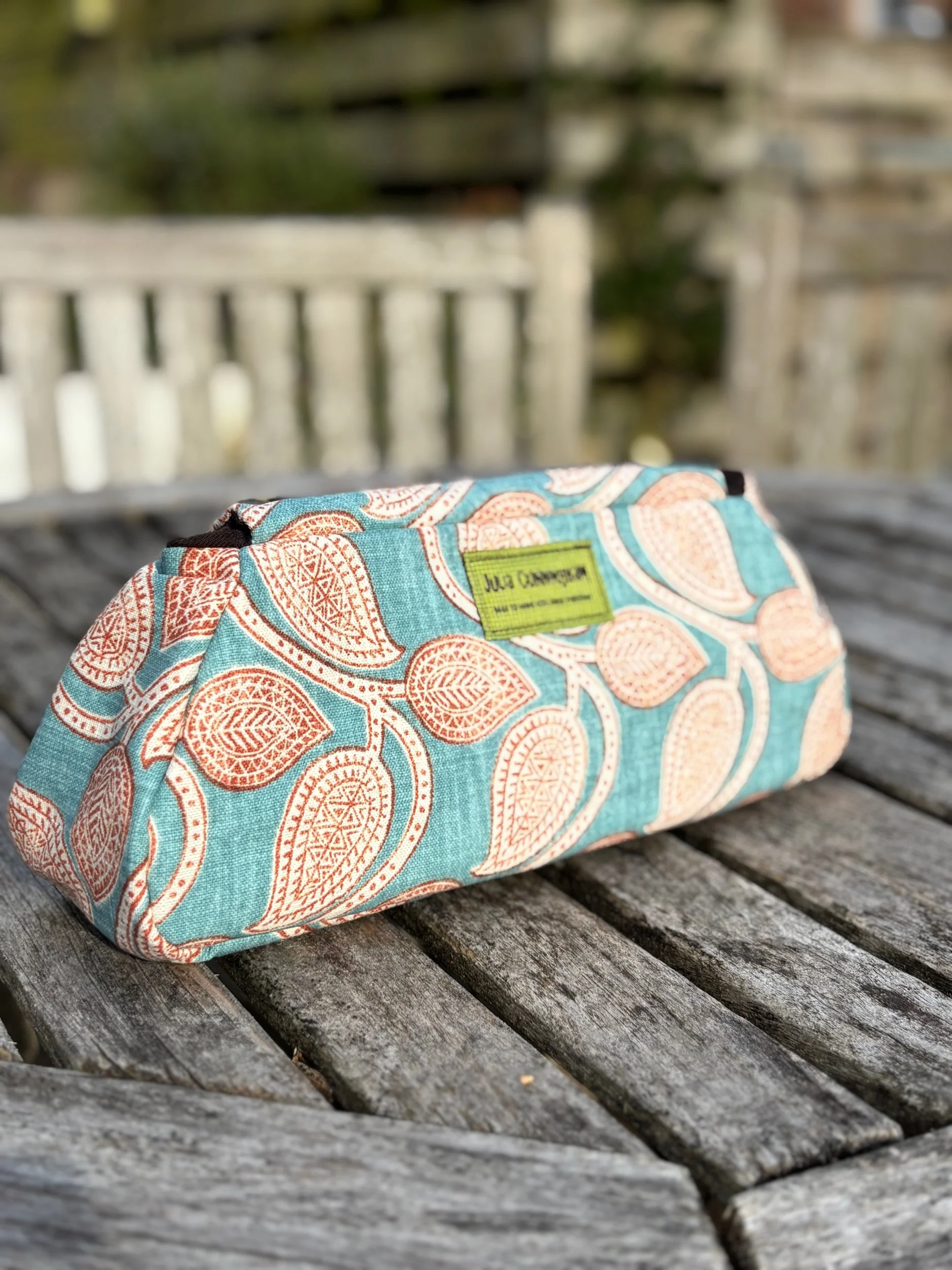 Back view of handmade paisley cotton clutch bag eco friendly purse by Julia Cunningham